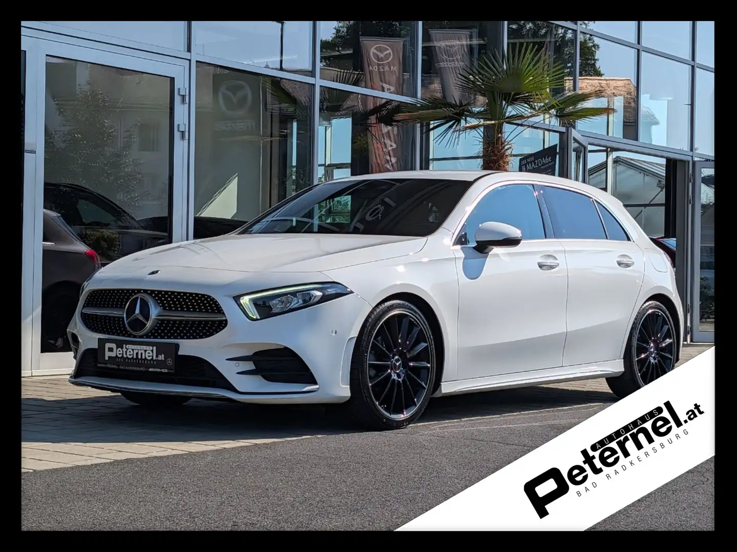 Mercedes-Benz A 180 AMG Line MBUX PTS Shz LED Navi AR AMG AUT Weiß - 1