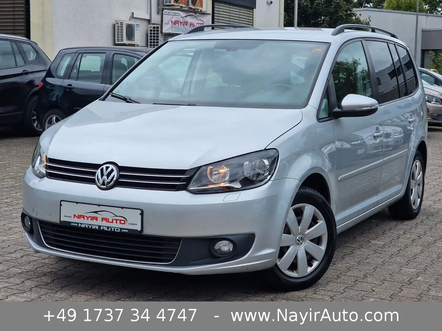 Volkswagen Touran Comfortline|7Sitz|Navi|PDC|Sitzheiz|8xRei Silber - 1