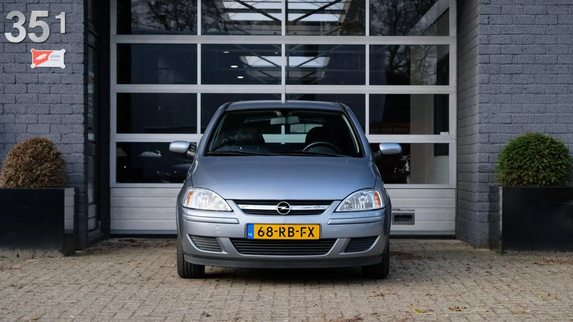 Opel Corsa 1.2-16V Full Rhythm Airco | Bluetooth Grijs - 2