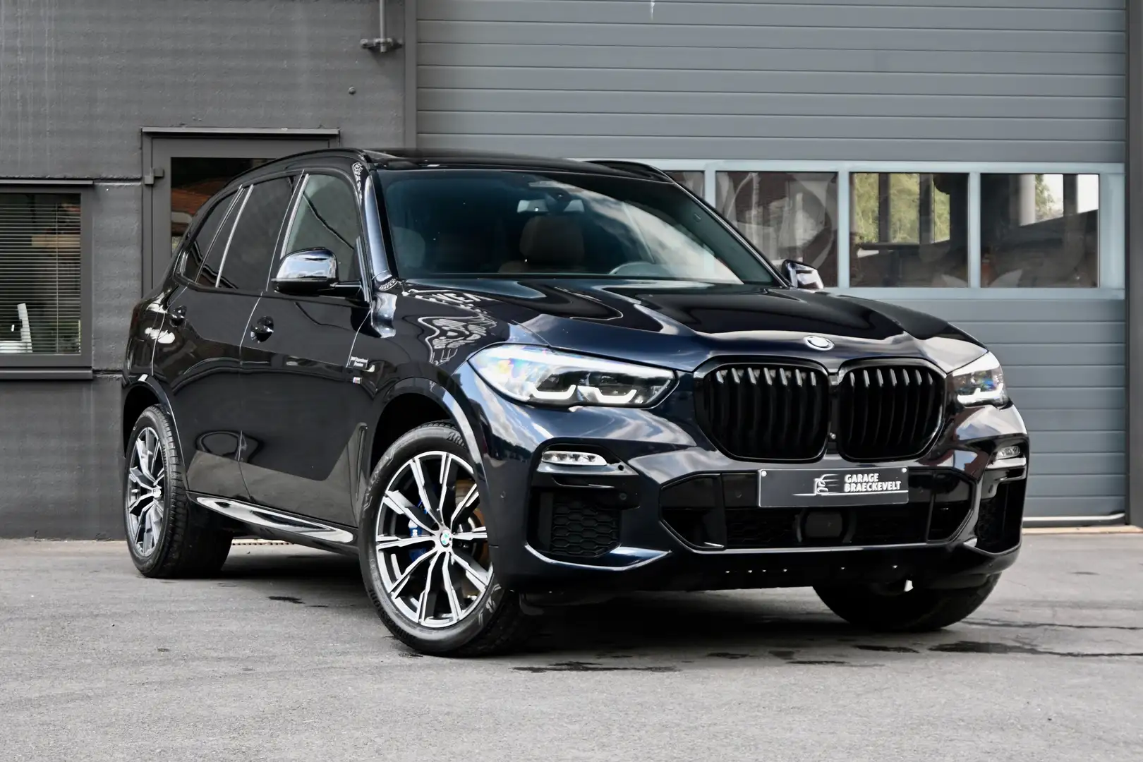BMW X5 3.0dAS Xdrive - Mpack - Pano - Comfseats -Trekhaak Nero - 1