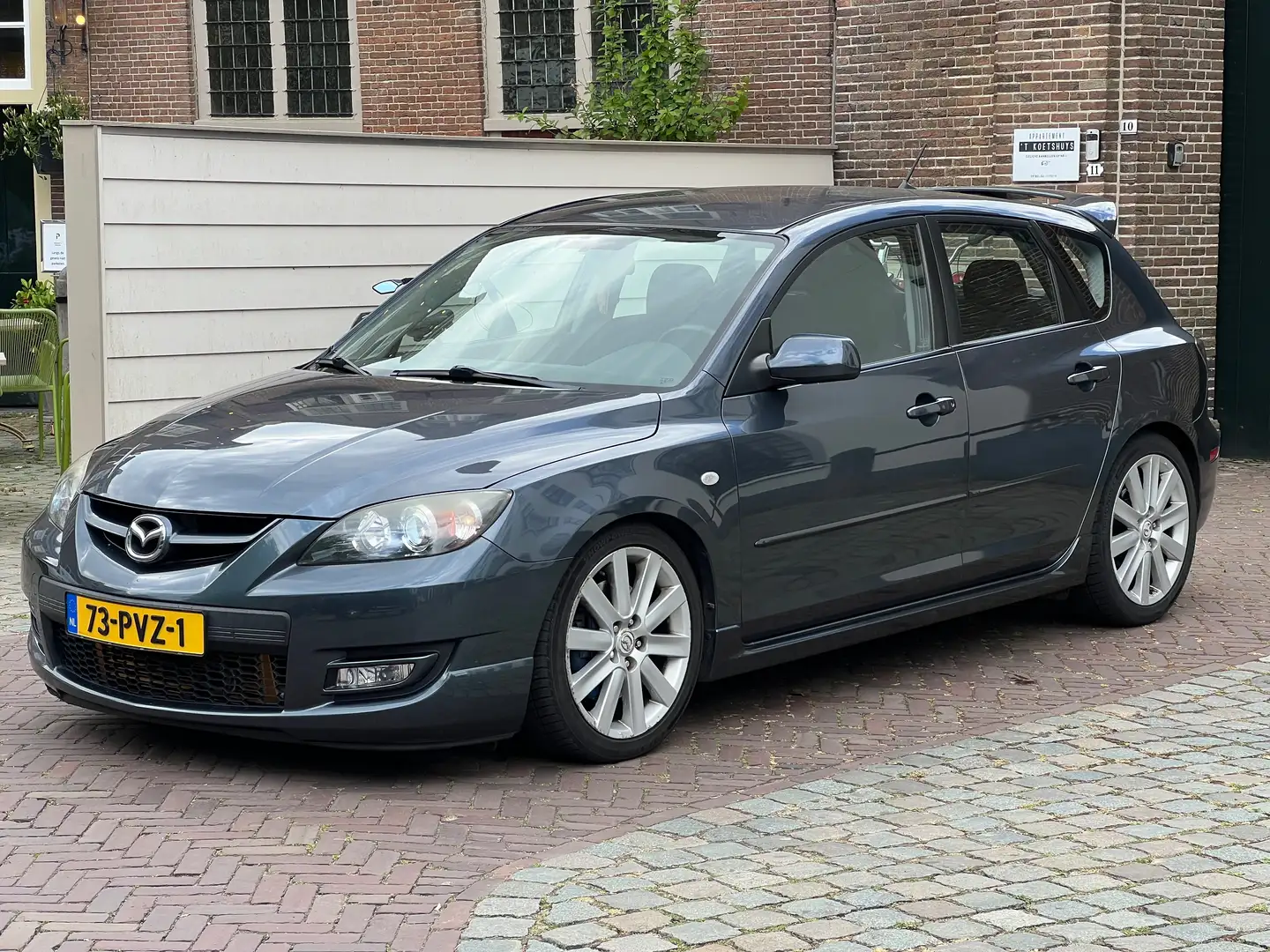 Mazda 3 2.3 MPS Motor Nieuw/Apple CarPlay/Cruise/Airco/NAP Gris - 1