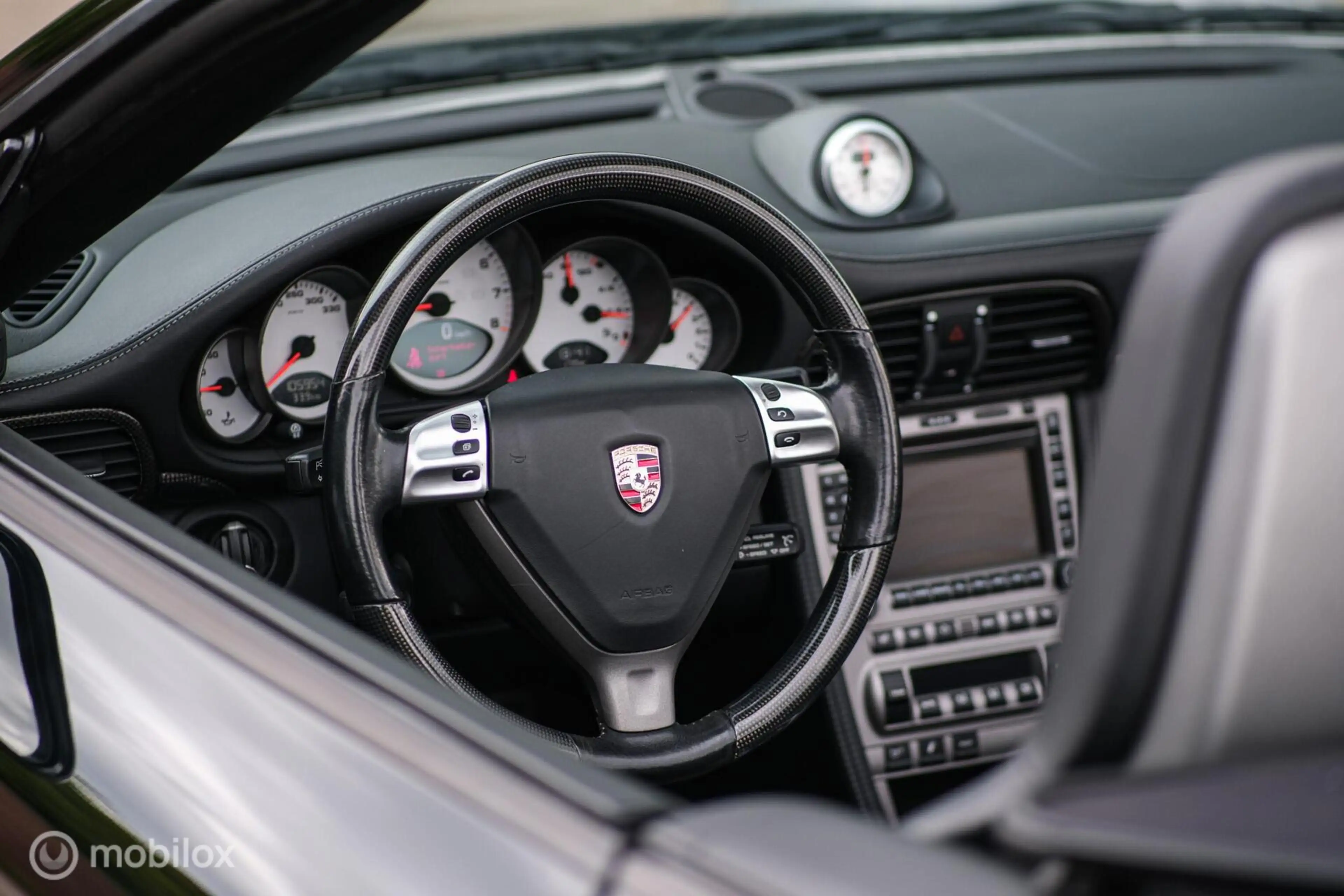 Porsche 997 Cabrio 3.8 Carrera S — photo 28