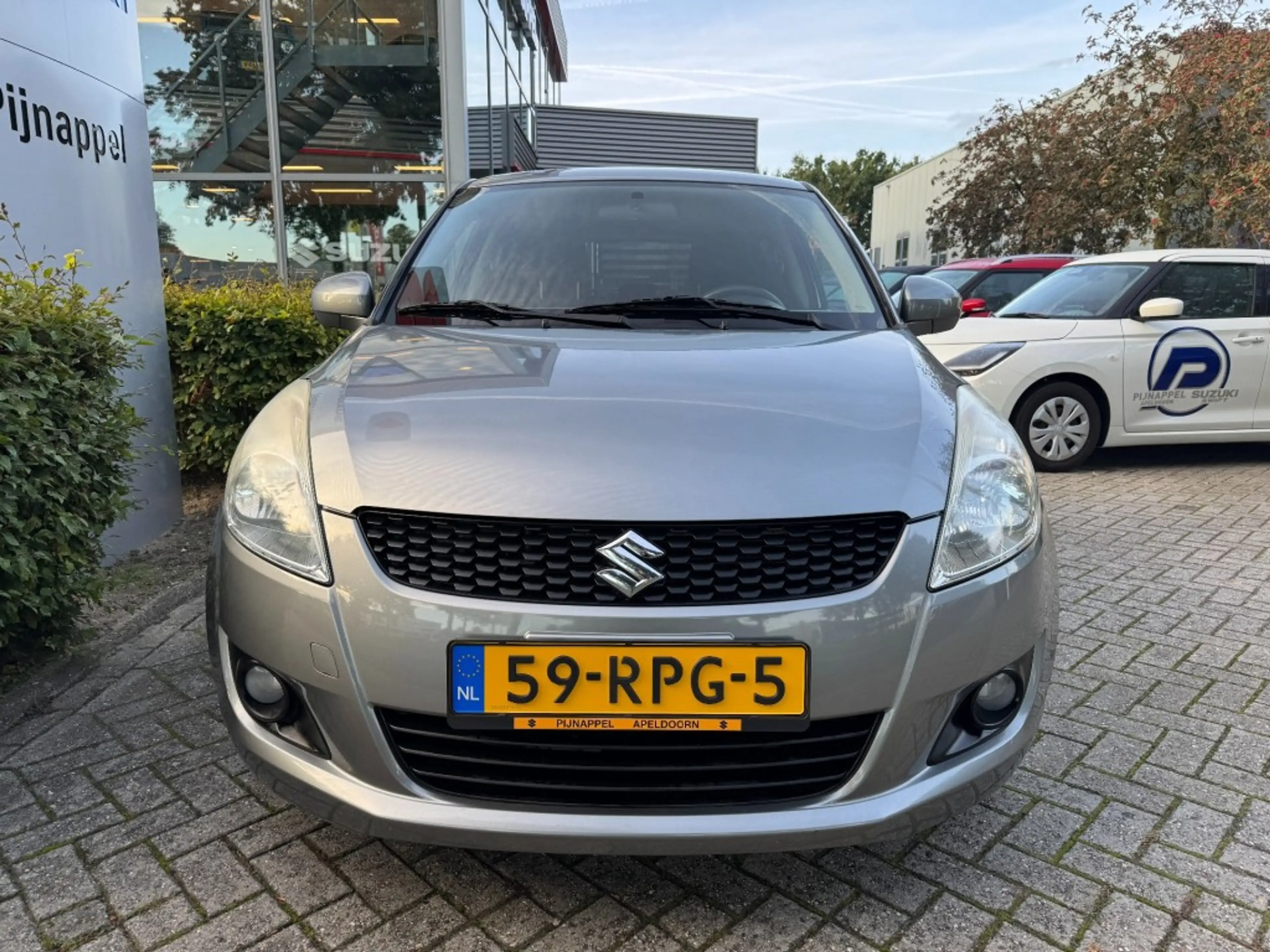 Suzuki Swift 1.2 Exclusive 5-deurs Airco / L.m.velgen / 1e eige — photo 4