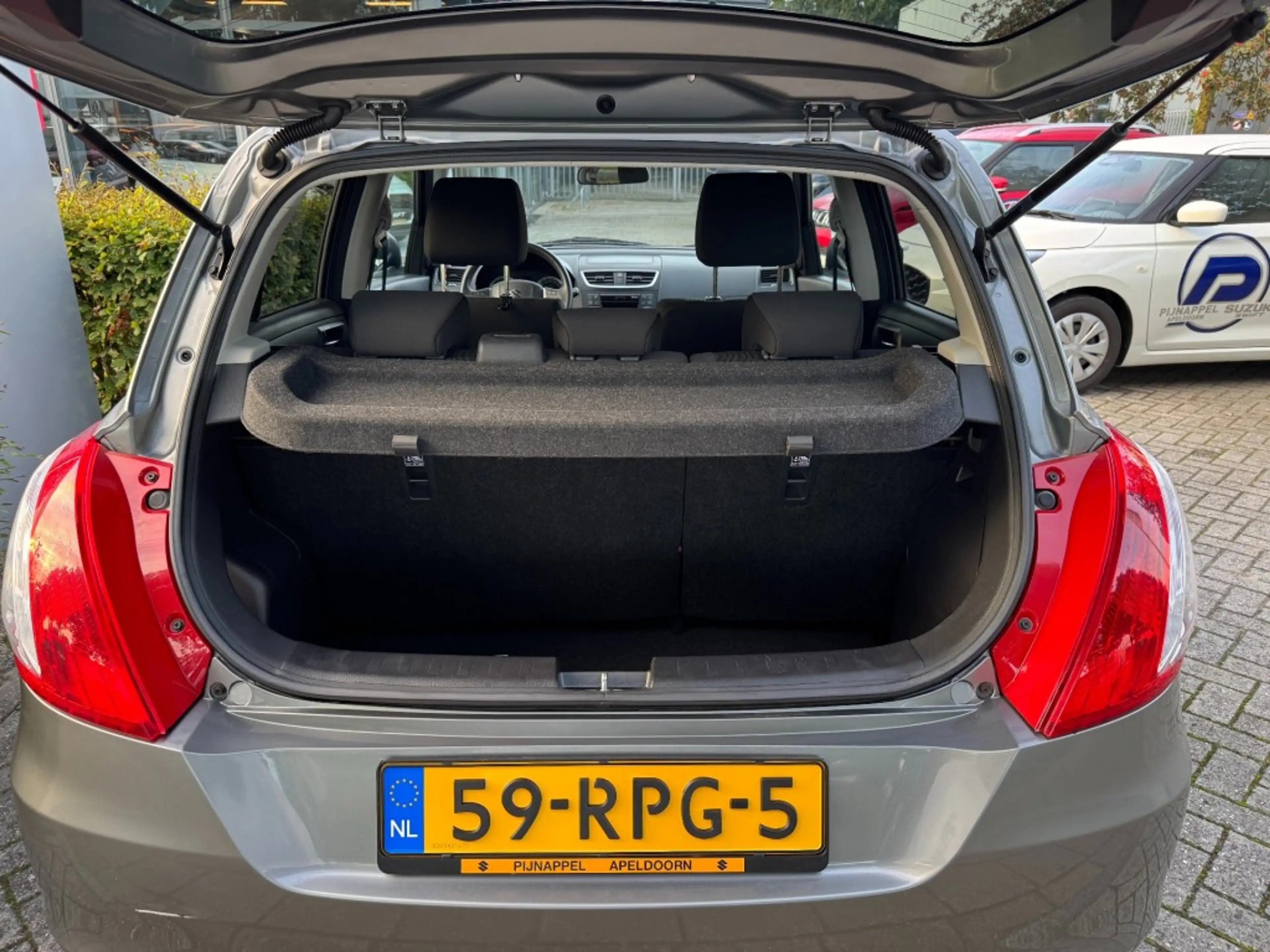 Suzuki Swift 1.2 Exclusive 5-deurs Airco / L.m.velgen / 1e eige — photo 12