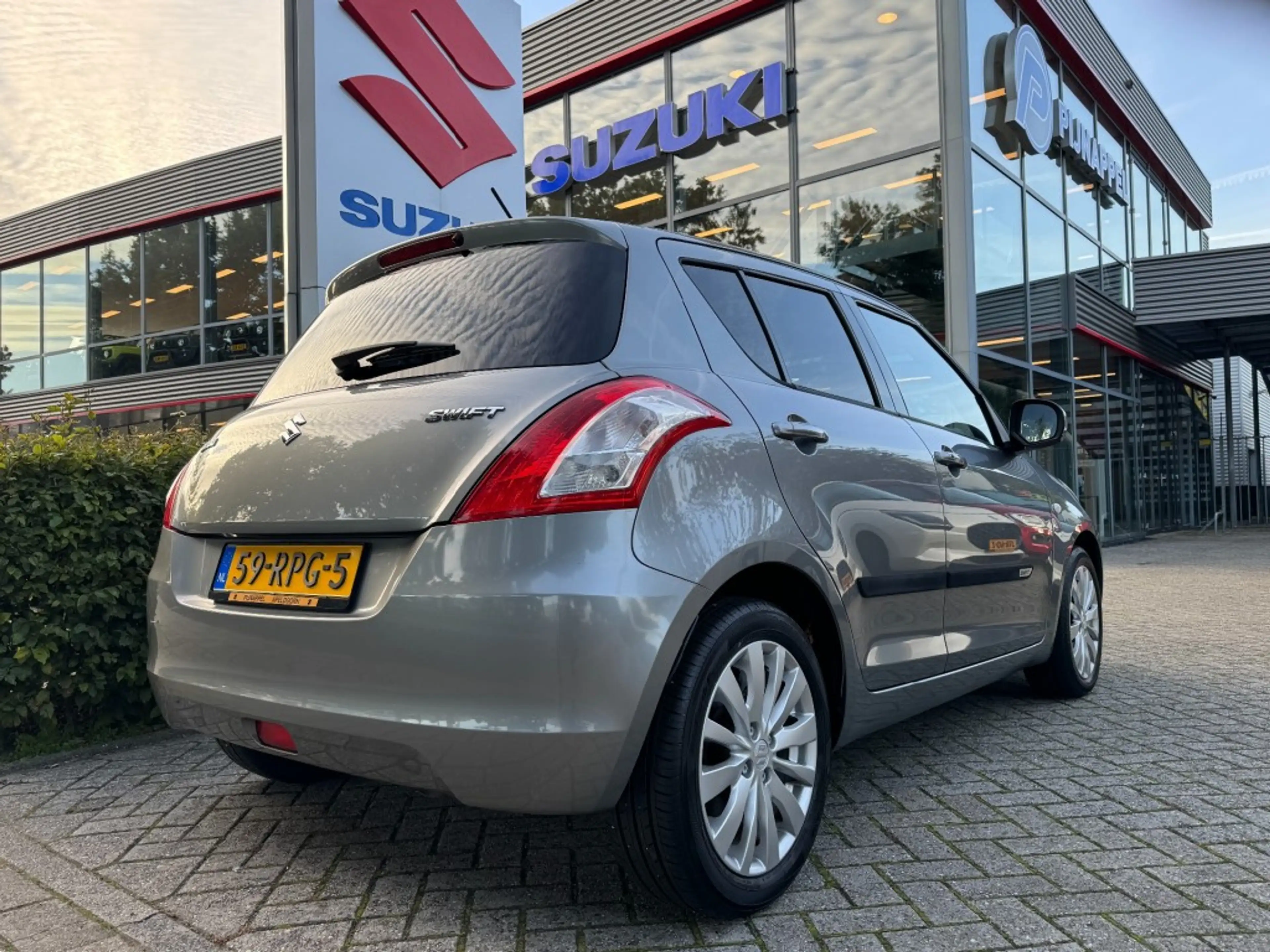 Suzuki Swift 1.2 Exclusive 5-deurs Airco / L.m.velgen / 1e eige — photo 8