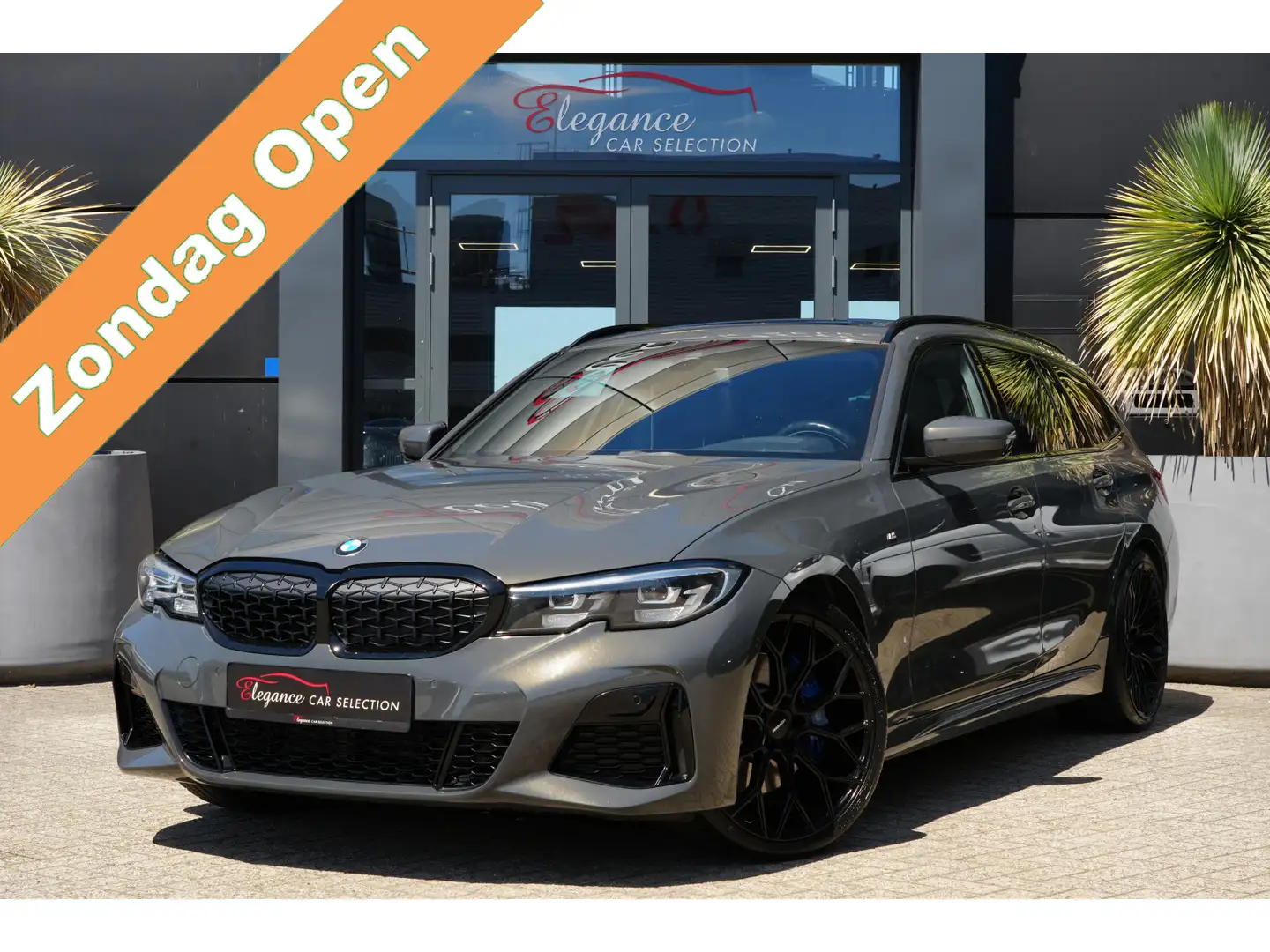 BMW 340 3-serie Touring M340i xDrive High Executive 374pk Grijs - 1
