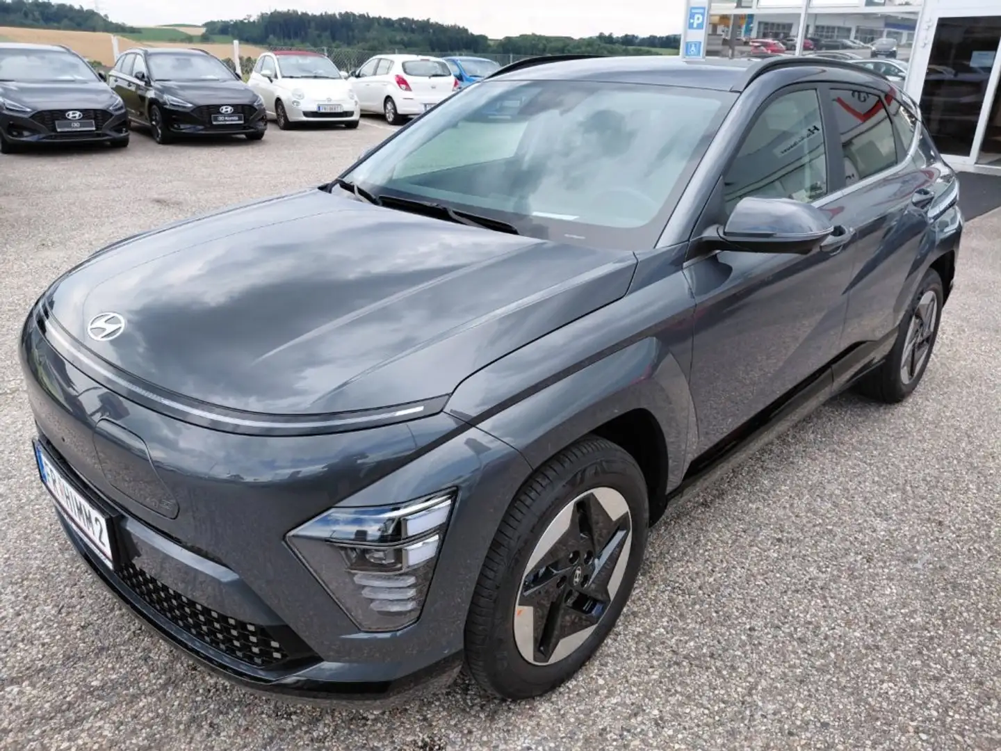 Hyundai KONA EV (SX2) Comfort Line 64,8 kWh k7ec2-P22/26 Grau - 1