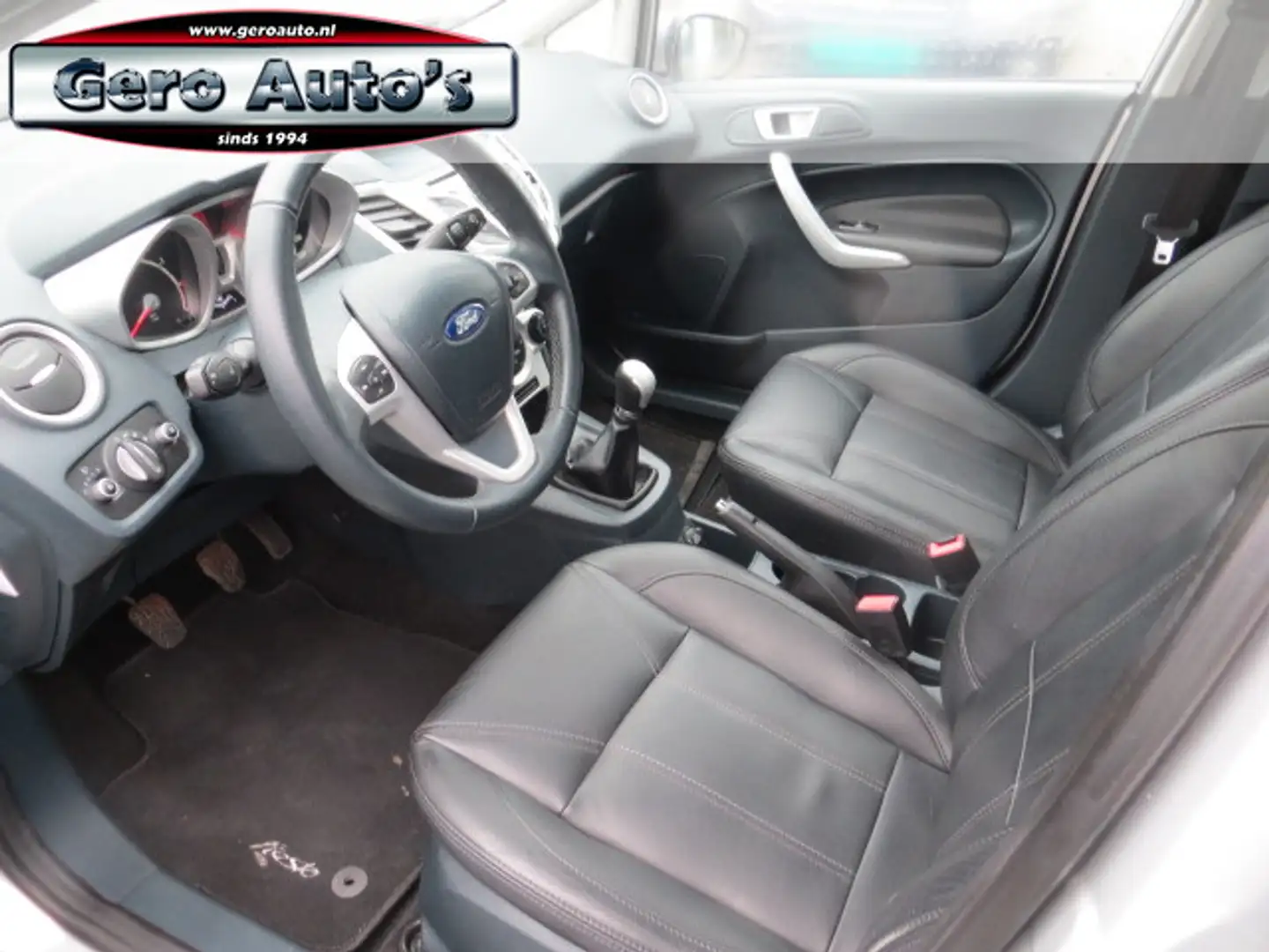 Ford Fiesta 1.25 Titanium 5drs leder ,airco ecc,pdc 16 inch et Grijs - 2