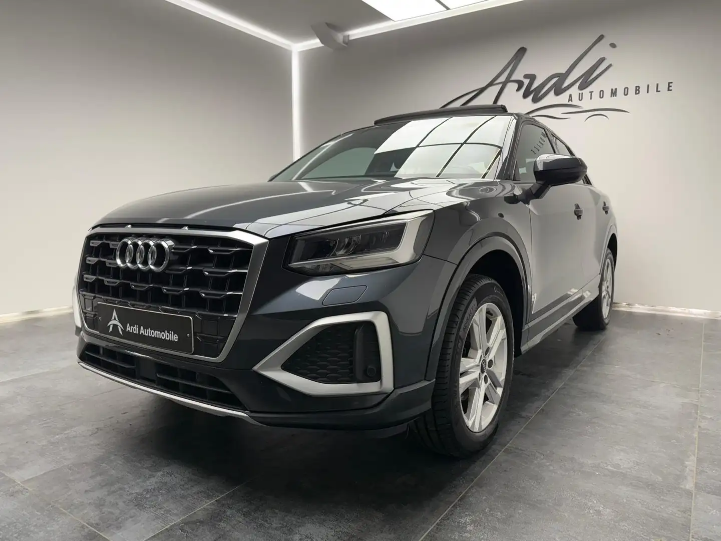 Audi Q2 2.0 TDi Stronic Sport*GARANTIE*1ER PROP*TOIT OUV* Grijs - 1