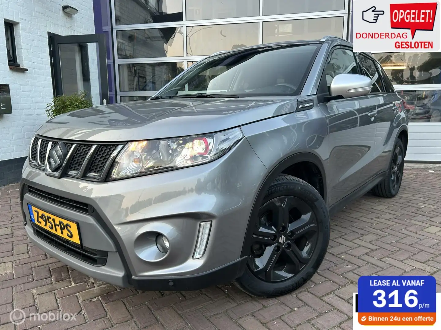 Suzuki Vitara 1.4 S Allgrip 4x4 AUTOMAAT * AIRCO * TREKHAAK Grijs - 1