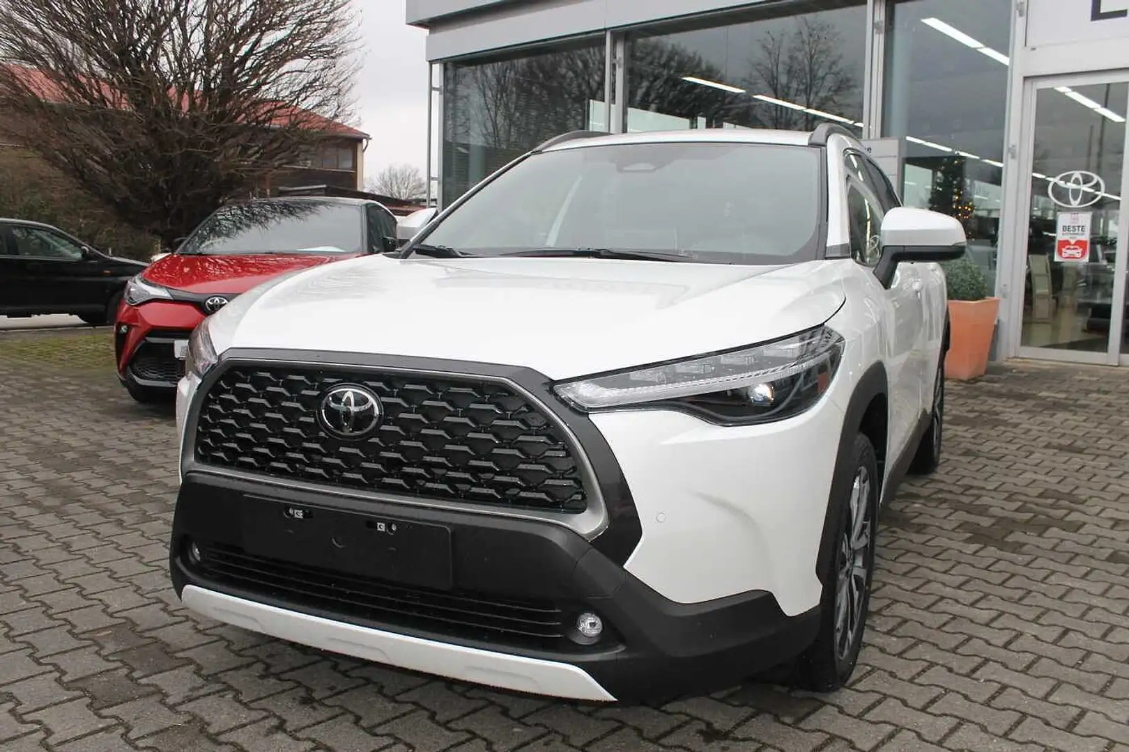 Toyota Corolla Cross 1,8 Hybrid Style KAMERA/Navi/el. Heckklappe Weiß - 1