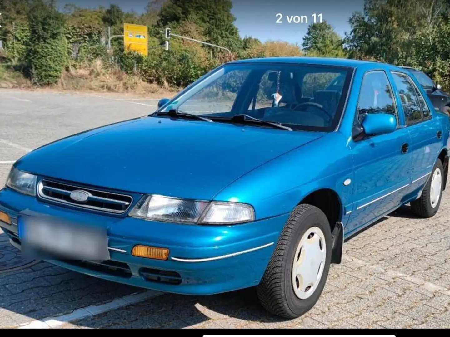 Kia Sephia Automatik,Tüv 12.2026 Allwetterreifen Modrá - 1