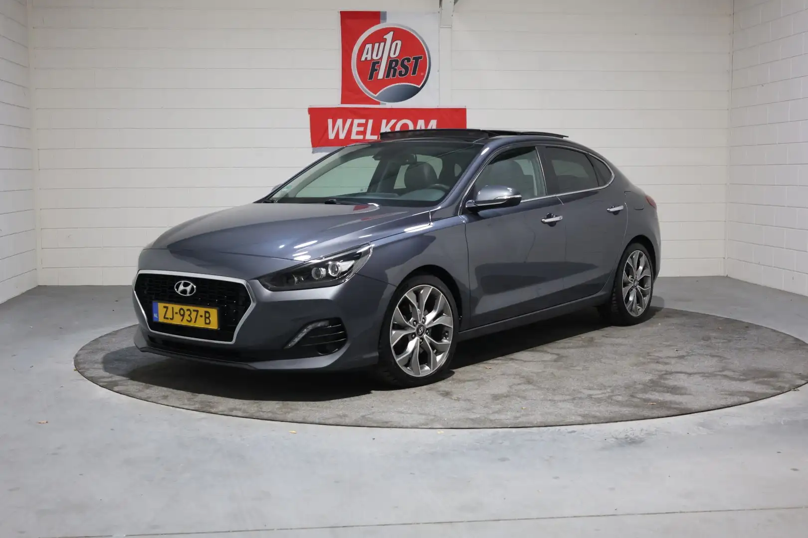 Hyundai i30 Fastback 1.4 T-GDI Premium, Meest Luxe uitvoering, Grigio - 1