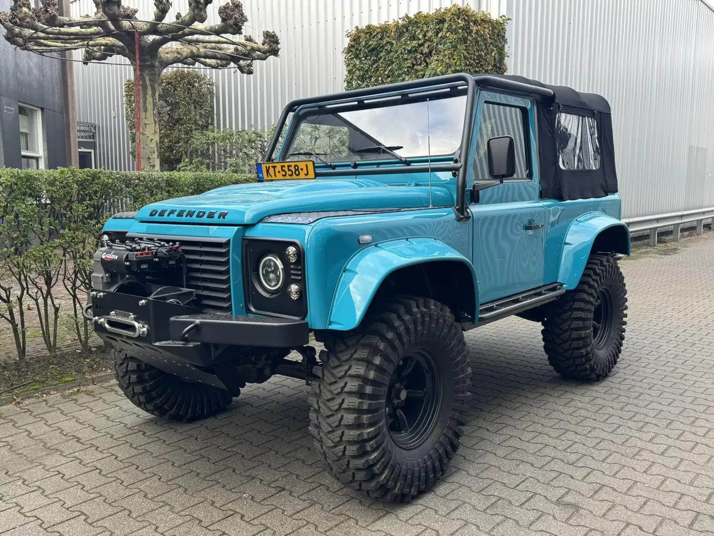 Land Rover Defender 90 soft top custom 2.4 TD 4 zits Miami Blue Blauw - 1