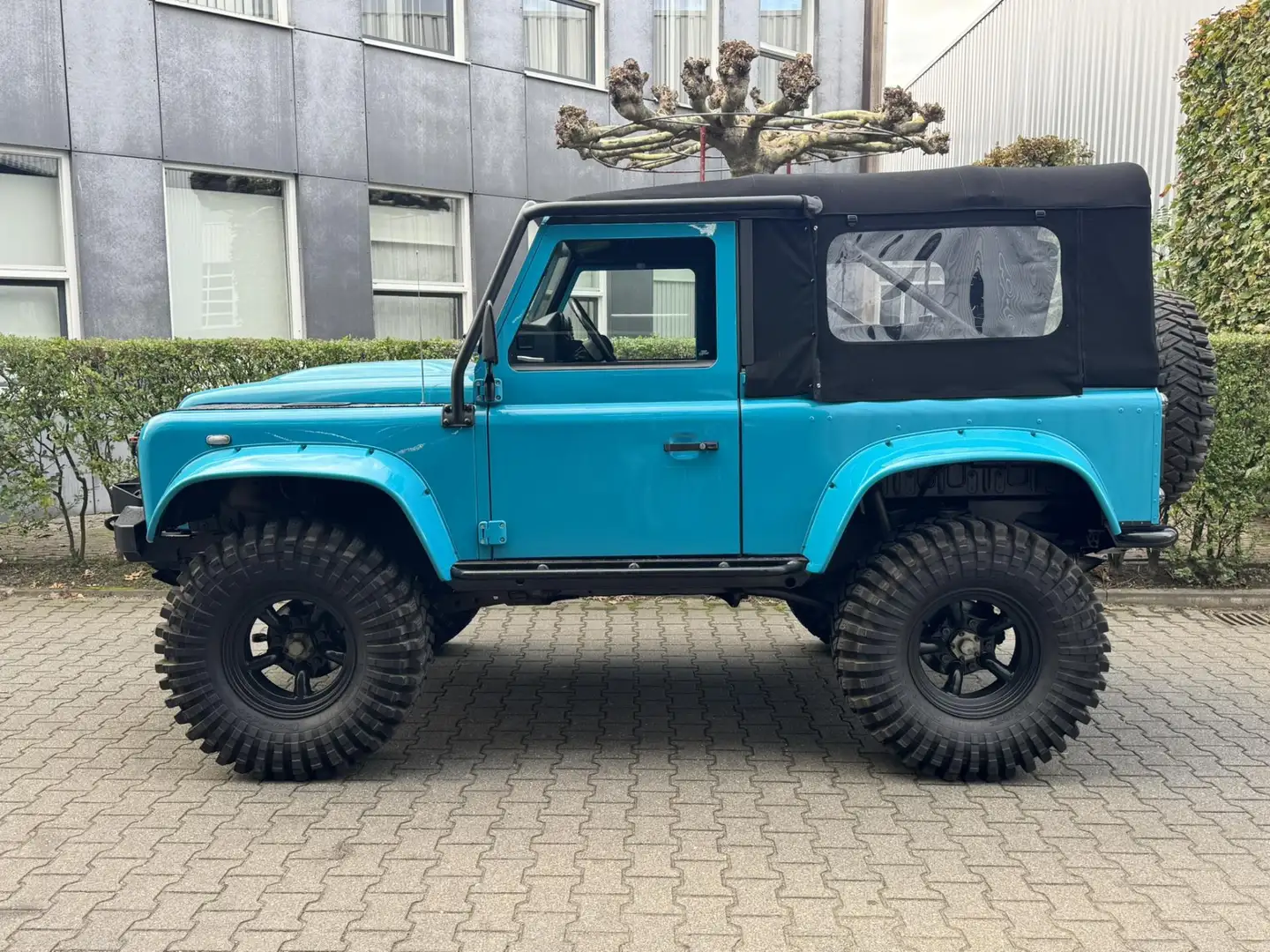 Land Rover Defender 90 soft top custom 2.4 TD 4 zits Miami Blue Blauw - 2