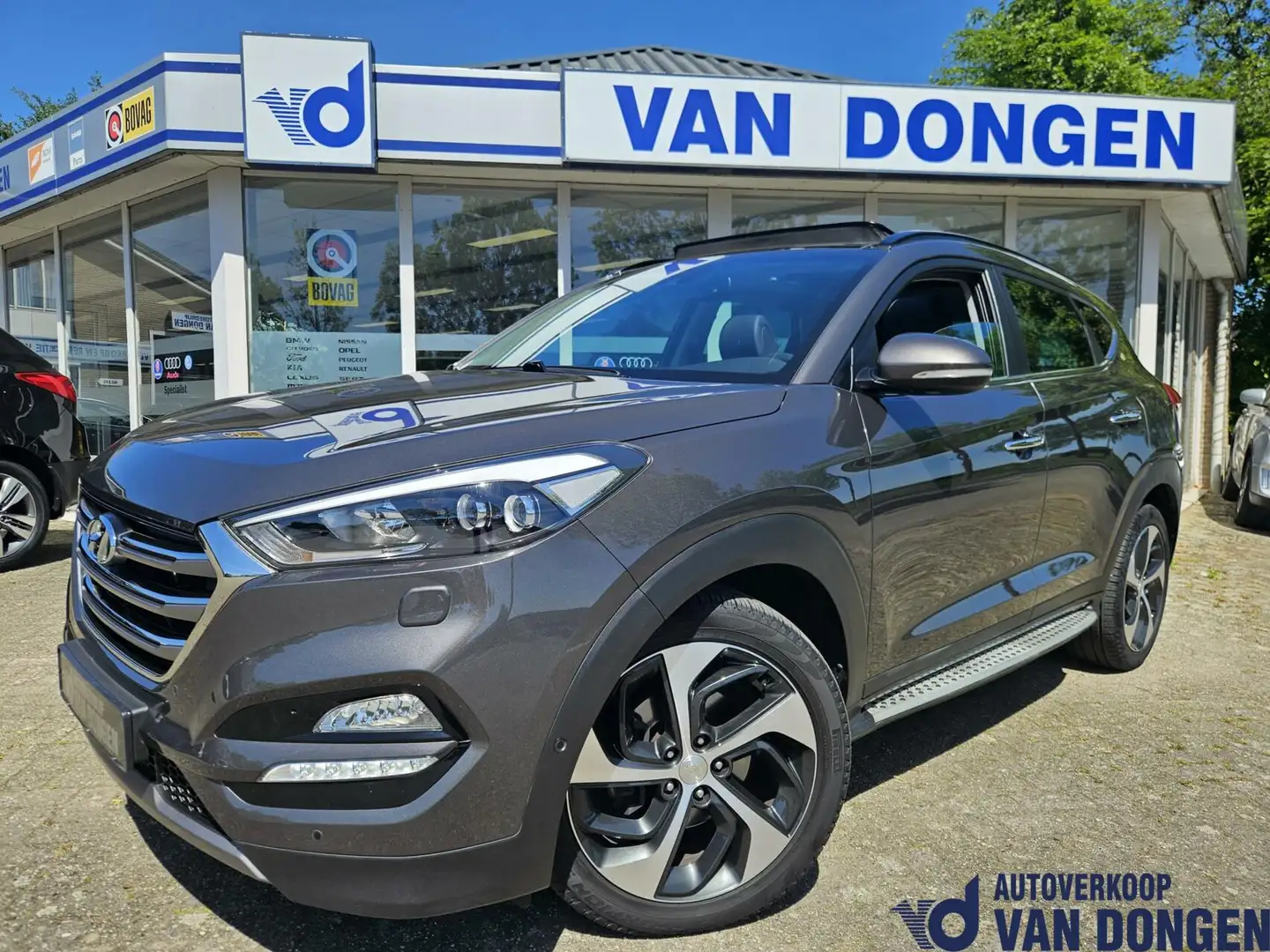 Hyundai TUCSON 1.6 T-GDi Premium 4WD | Trekhaak/Panorama/19"/Lede Gris - 1