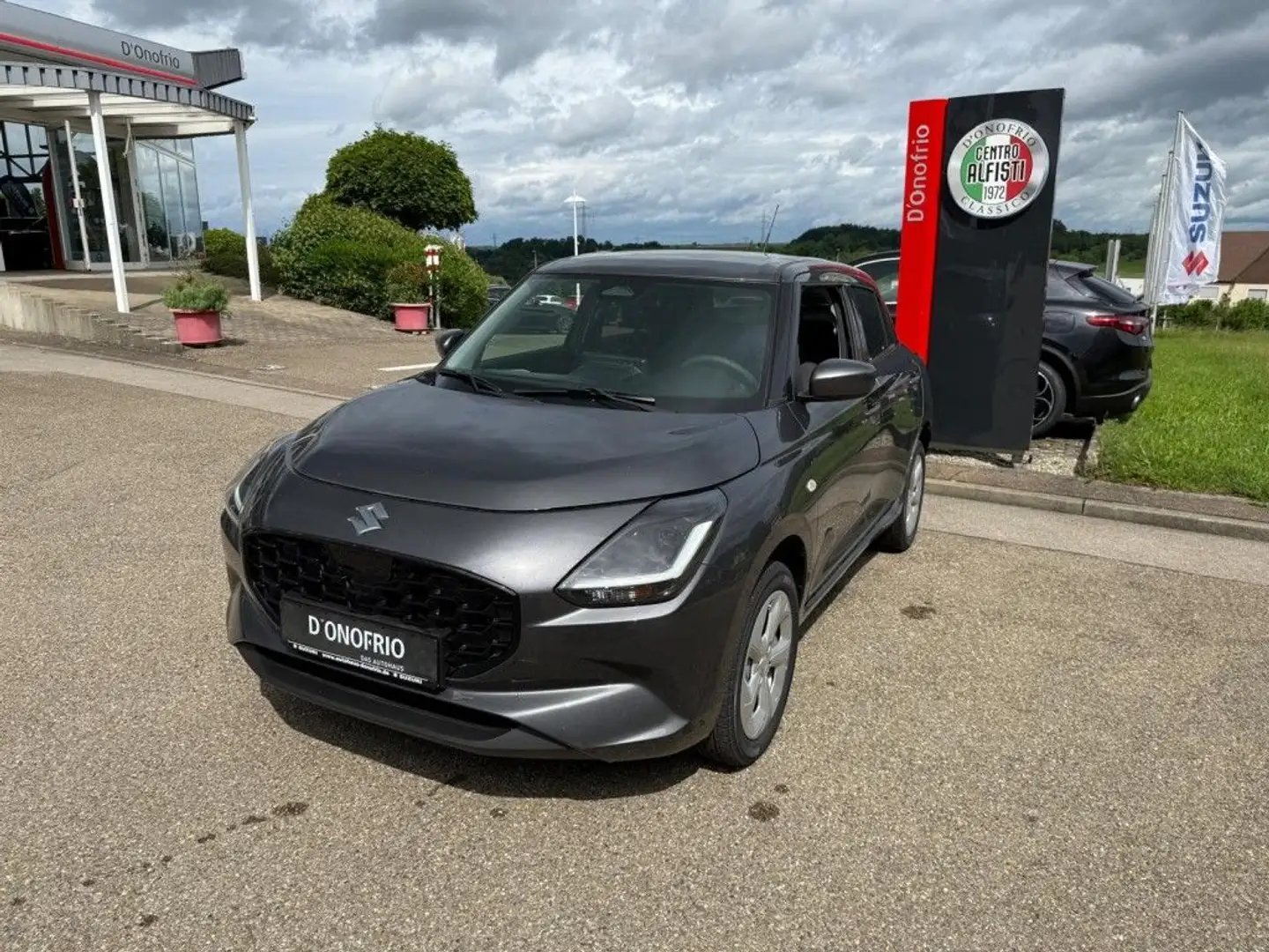 Suzuki Swift 1.2 Hybrid Allgrip MT Comfort Grijs - 1