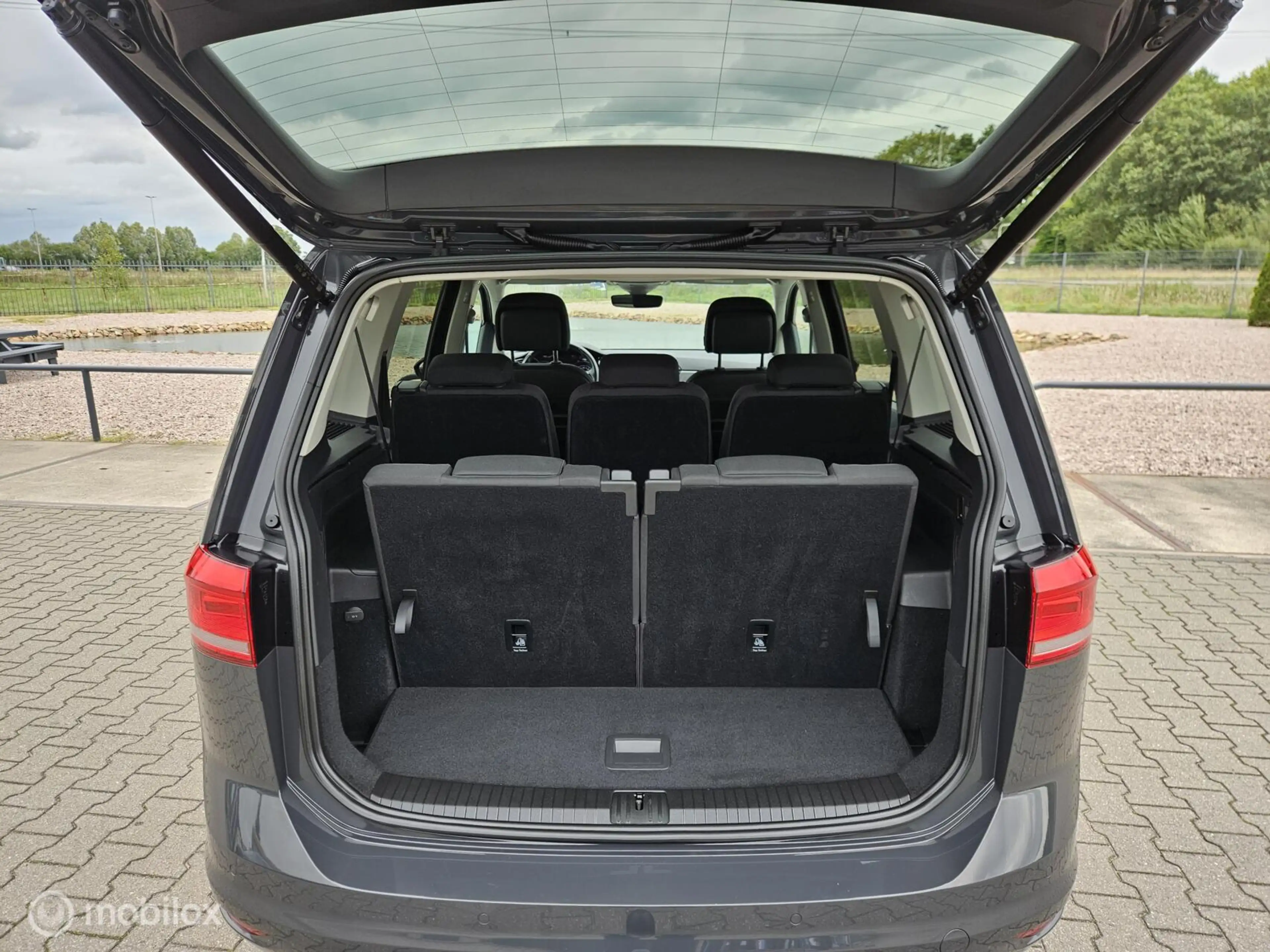 Volkswagen Touran 1.5 TSI Highline 7p/automaat/alle optie's — photo 7
