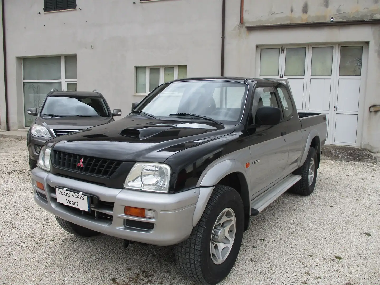 Mitsubishi L200 Club Cab 2.5 tdi GLX 4wd Club cab 4 posti Schwarz - 1