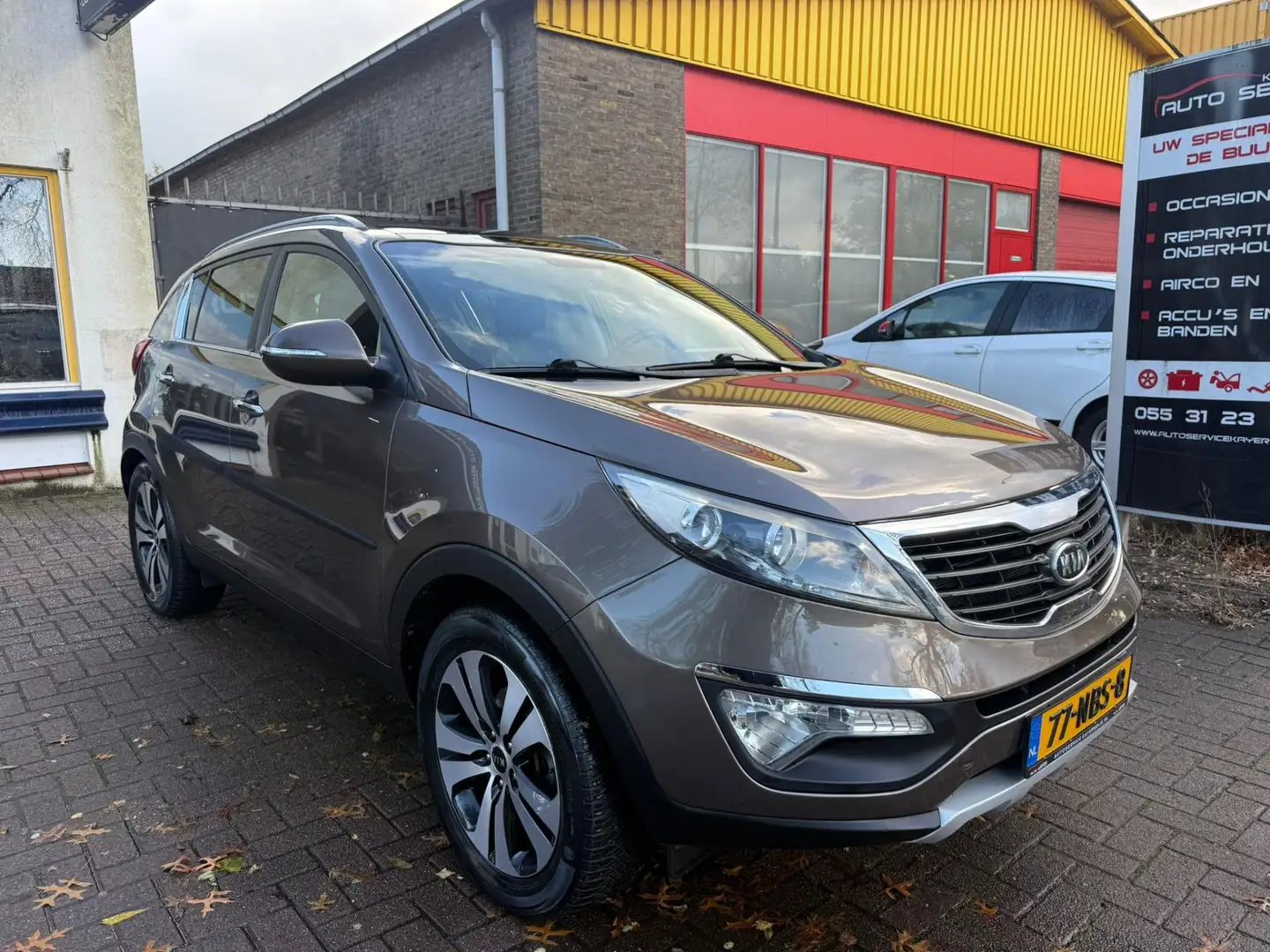 Kia Sportage 2.0 X-ecutive Plus Pack First Edition NL AUTO|LEER Brun - 1