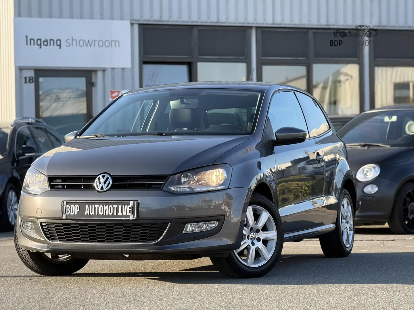 Volkswagen Polo 1.2 TSI Highline AIRCO/CRUISE/LM VELGEN Grijs - 1