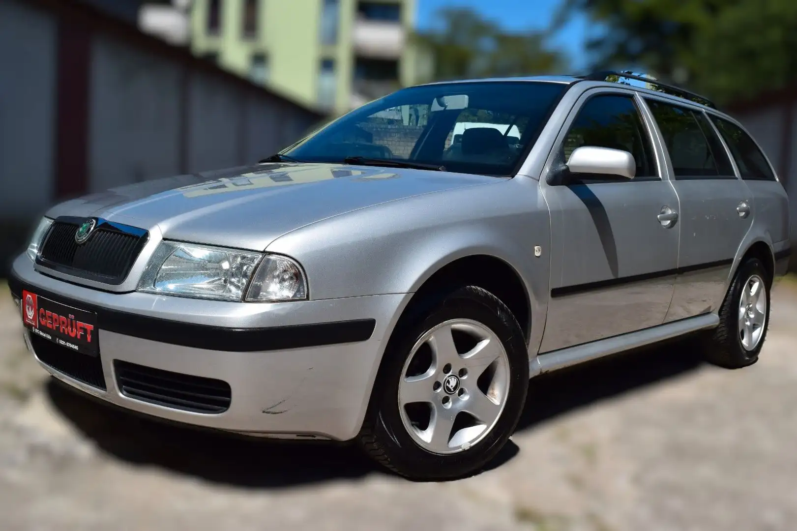Skoda Octavia Combi Tour,1.6/102 PS,Schiebedach,Tempom Srebrny - 1