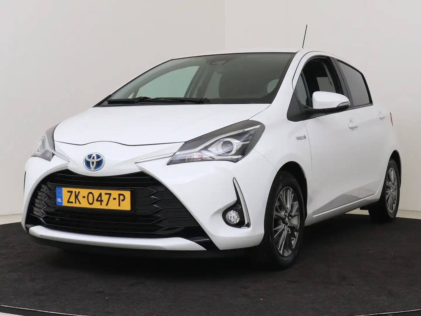 Toyota Yaris 1.5 Hybrid Dynamic I Navigatie I Climate Control I Wit - 1