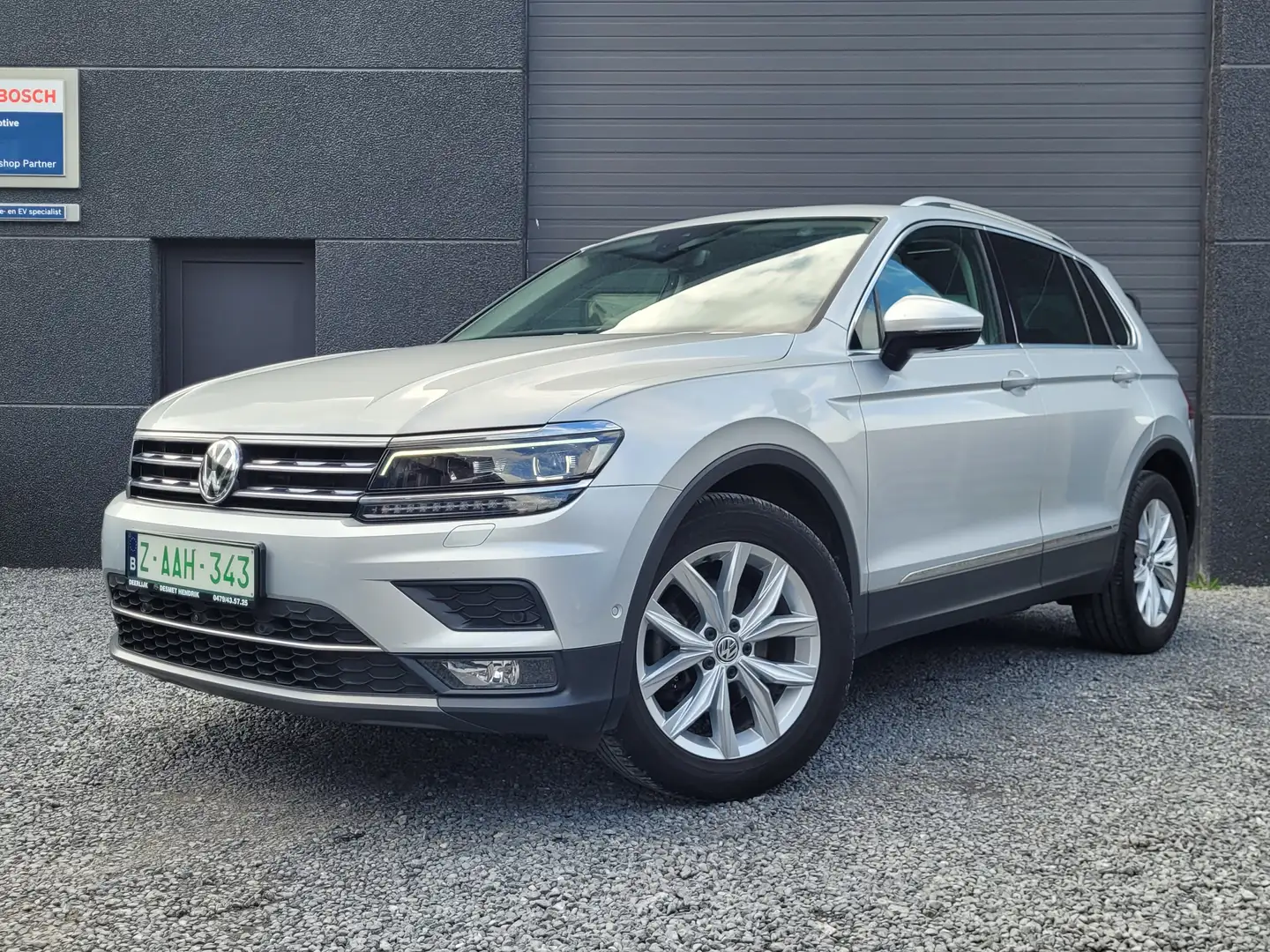 Volkswagen Tiguan 1.5 TSI ACT High OPF DSG CARPLAY/PANO/LEER/CAMERA Zilver - 1