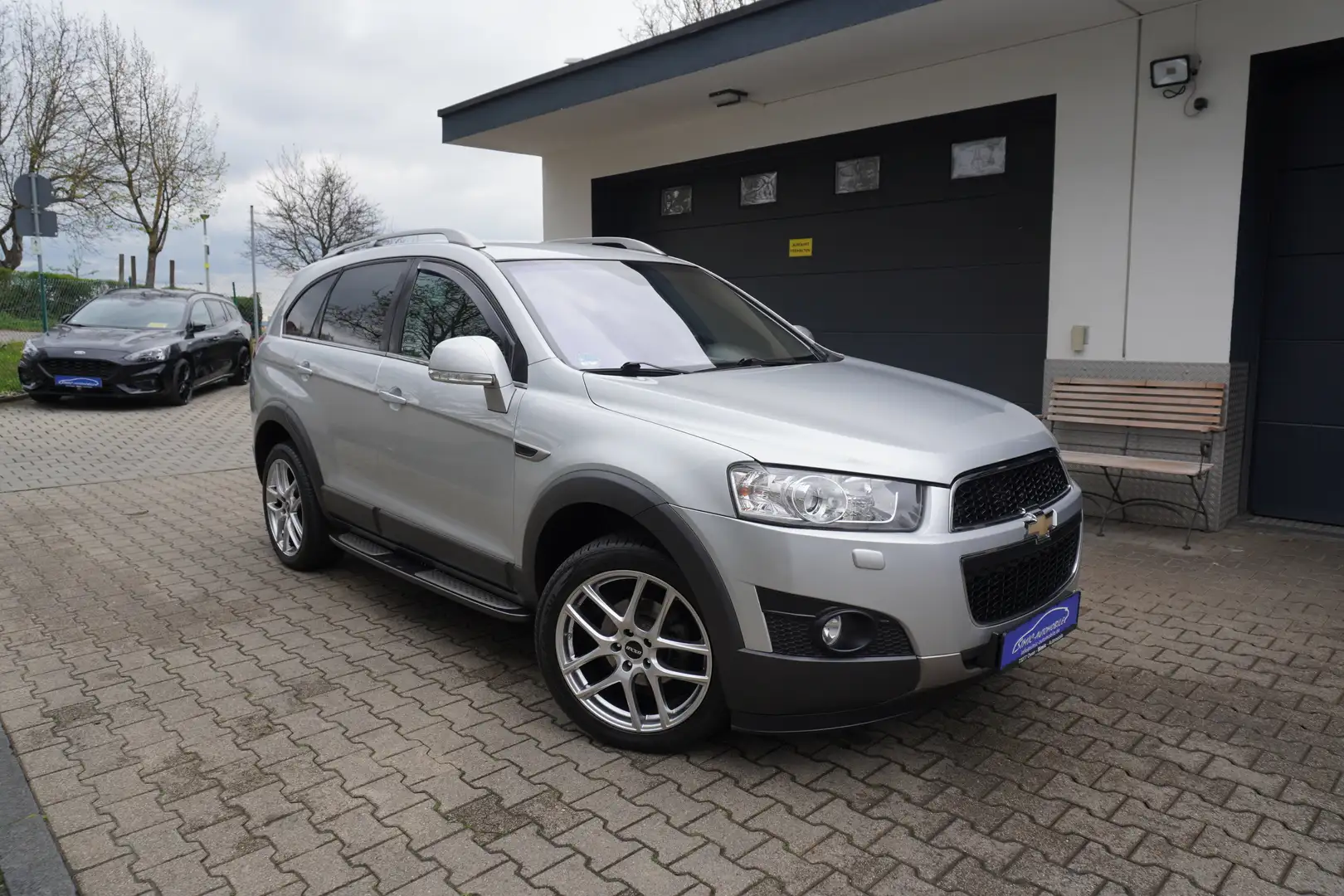Chevrolet Captiva 2.2 D LT+4x4 LEDER+NAVI+KAMERA+7-Sitze+Org.70.Tkm Argintiu - 1