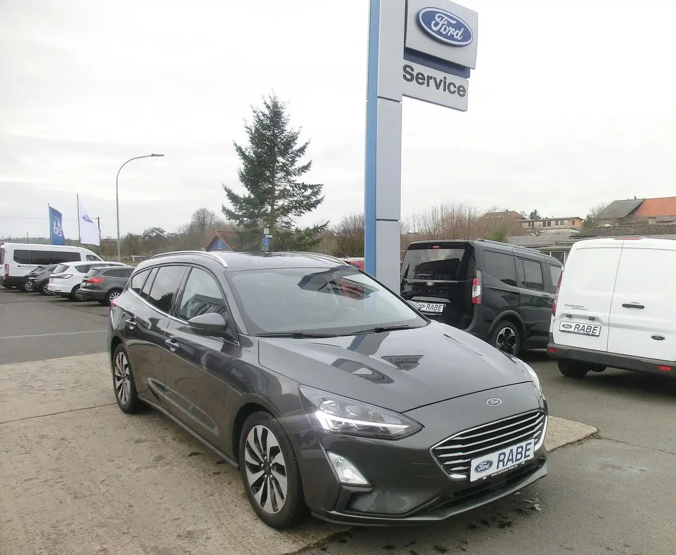 Ford Focus 1,5EB C&C Turnier/LED/Navi/PDC/GRA/17"/2Hd Grau - 1