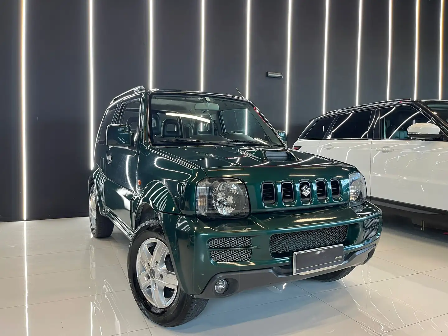 Suzuki Jimny 1.5 ddis JLX 4wd UNICO PROPRIETARIO GANCIO TRAINO Verde - 1
