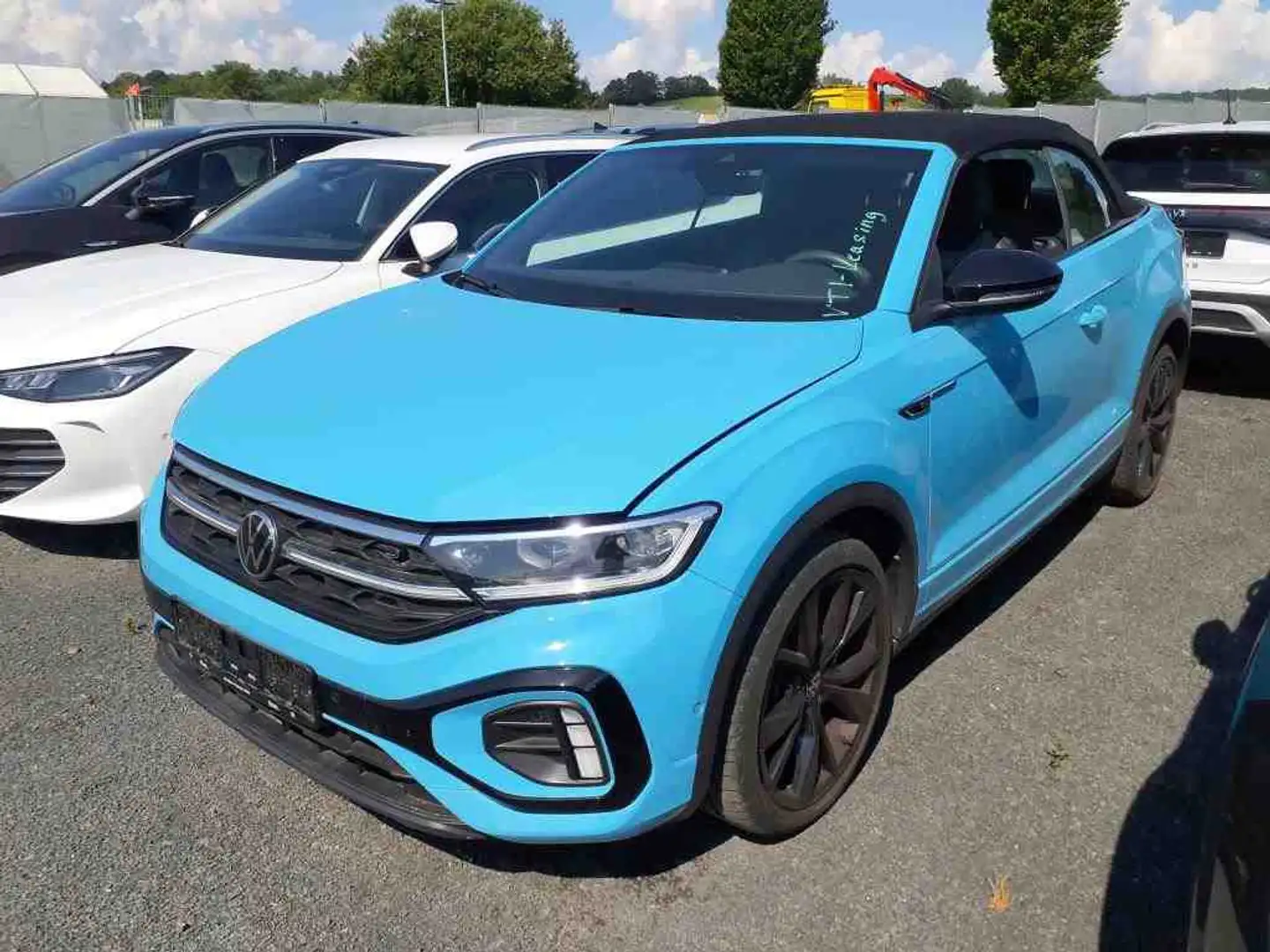 Volkswagen T-Roc Cabrio R-Line 1.5 TSI DSG NAVI KAMERA BEATS IQ LIGHT AID ALU 19 BLACK STYLE ASSIST SITZHEIZUNG CLIMATRONIC Blau - 1