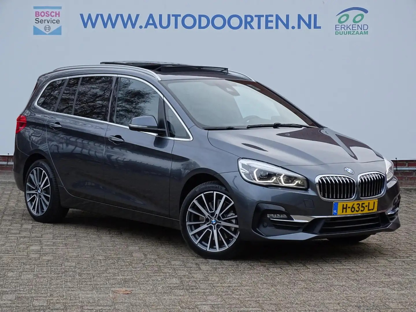 BMW 220 2-serie Gran Tourer 220i 7p. High Executive Editio Grijs - 1