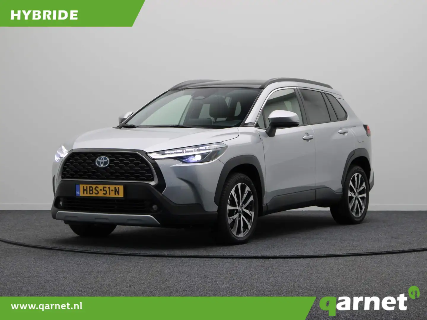Toyota Corolla Cross Hybrid 140 Style + Premium Pack II | 10 Jaar Garan Grijs - 1
