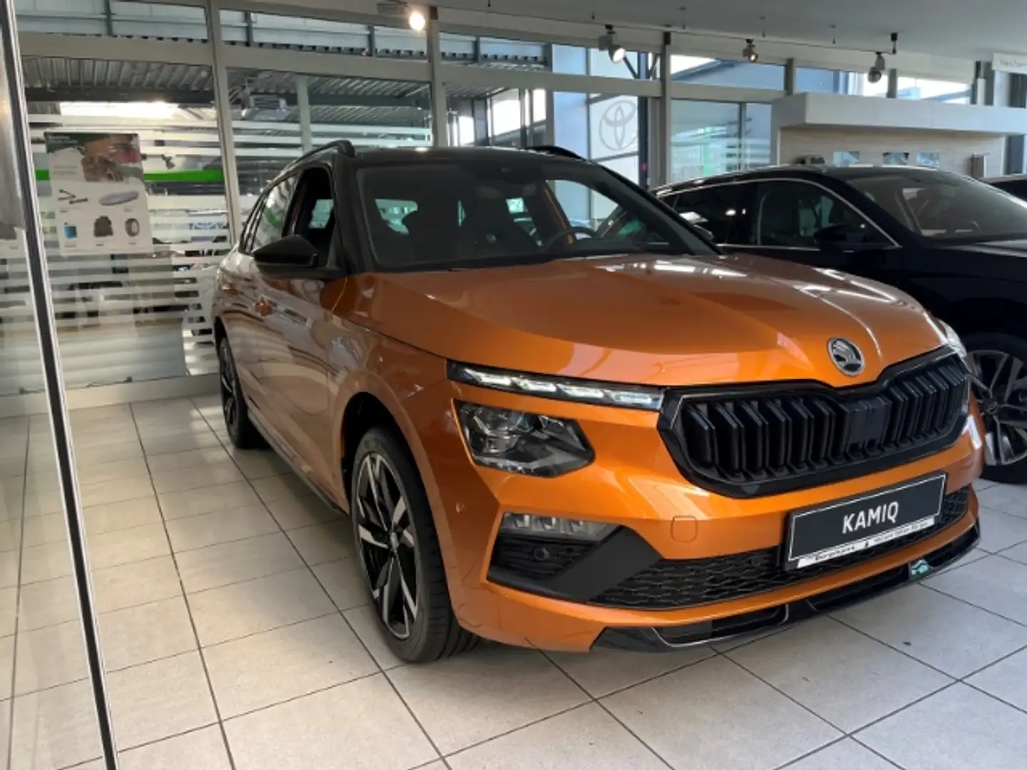 Skoda Kamiq 1.5 Monte Carlo DSG UPE: 42.940€ Sportpaket Panora Oranje - 2
