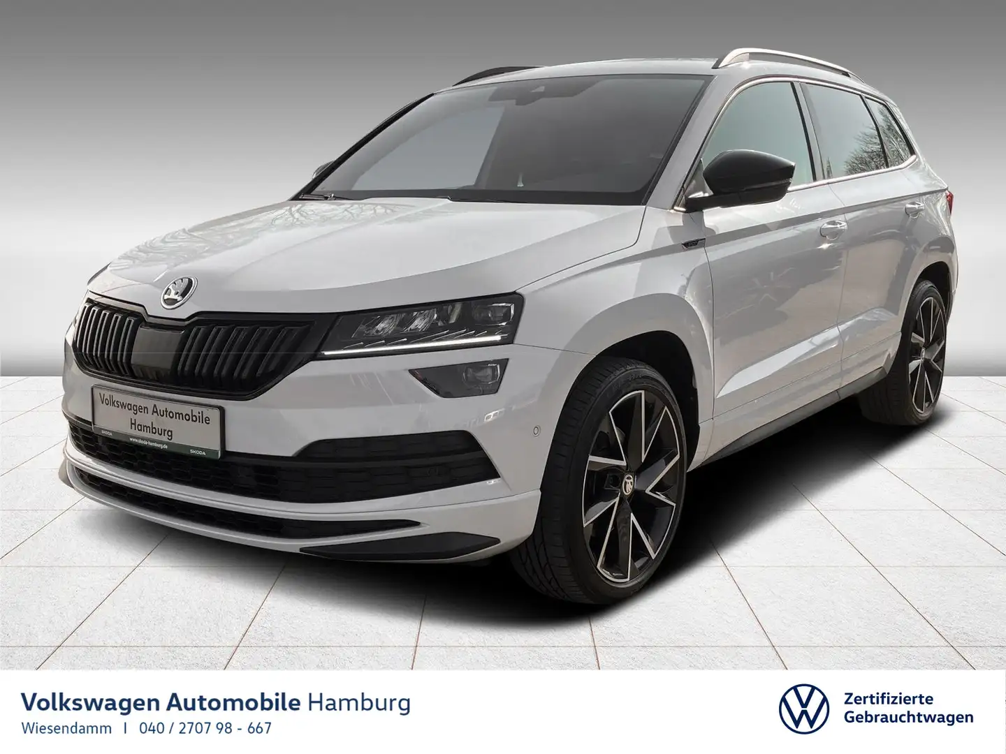 Skoda Karoq 2.0 TDI DSG Sportline 4x4 ACC/KAMERA/NAVI Wit - 1