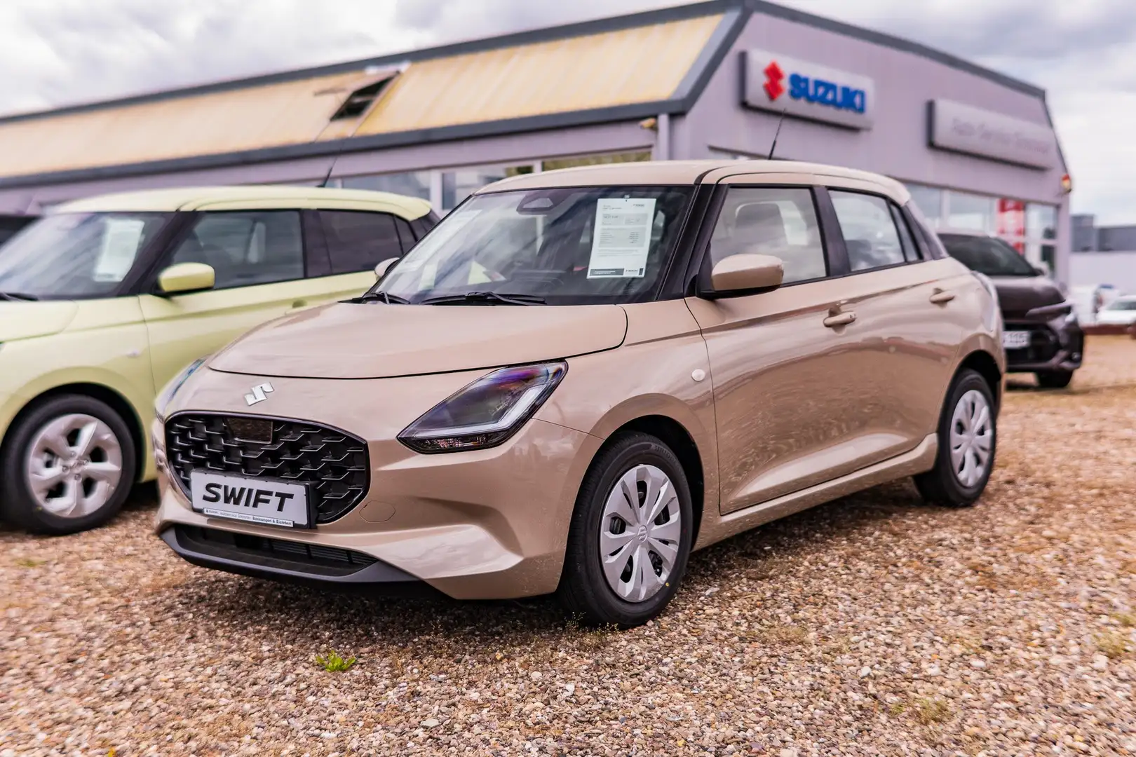 Suzuki Swift 1.2 Hybrid Allgrip MT Club Beige - 1