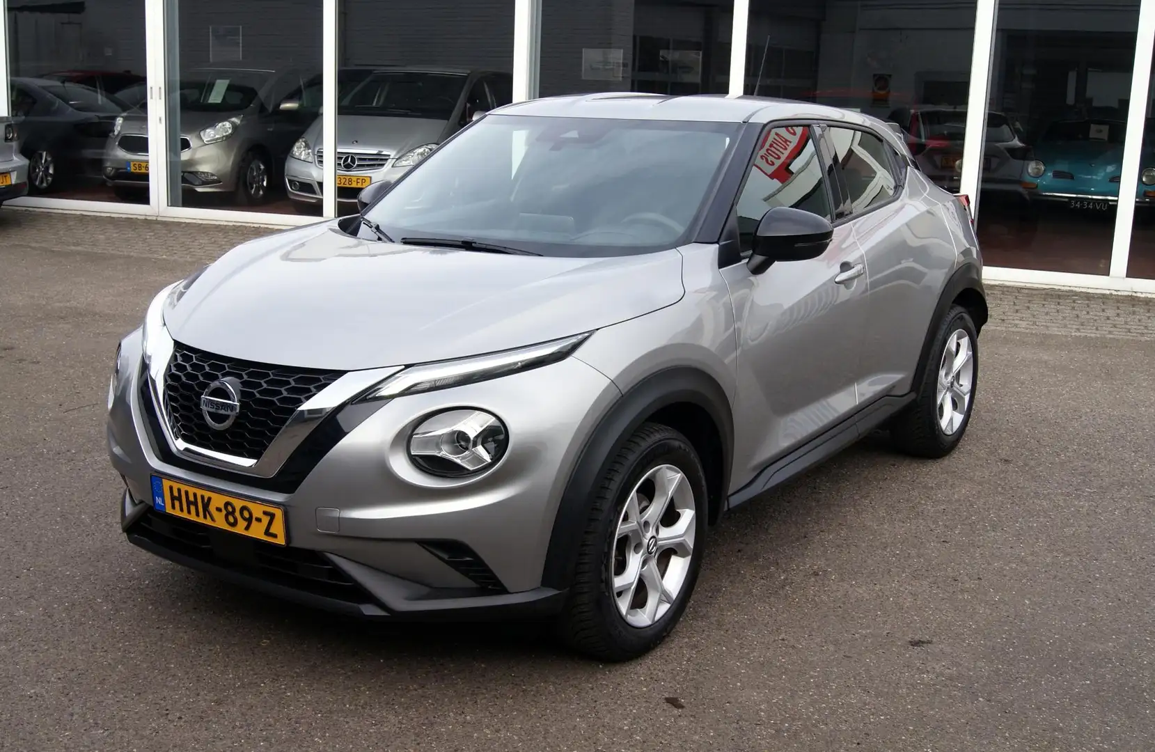 Nissan Juke 1.0 DIG-T Acenta Navi,Cruise,Camera,RIJKLAARPRIJS! Gris - 1