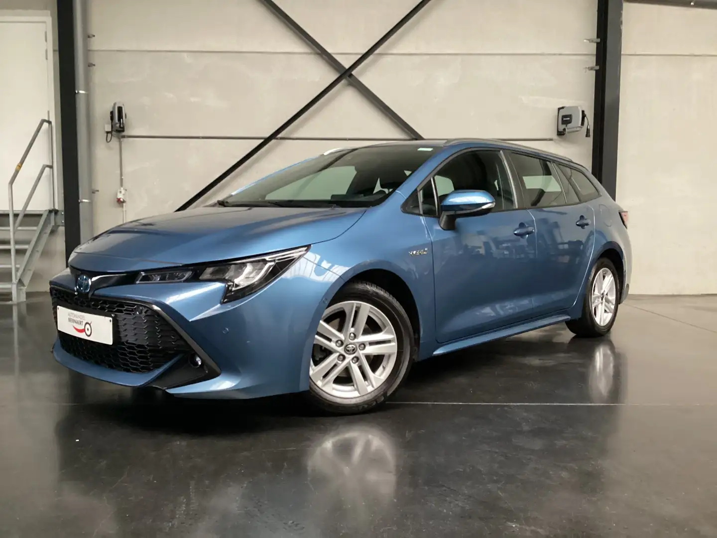 Toyota Corolla 1.8i Hybrid/1steEig/55000km/Cam/Carplay/LED/Cruise Blauw - 1
