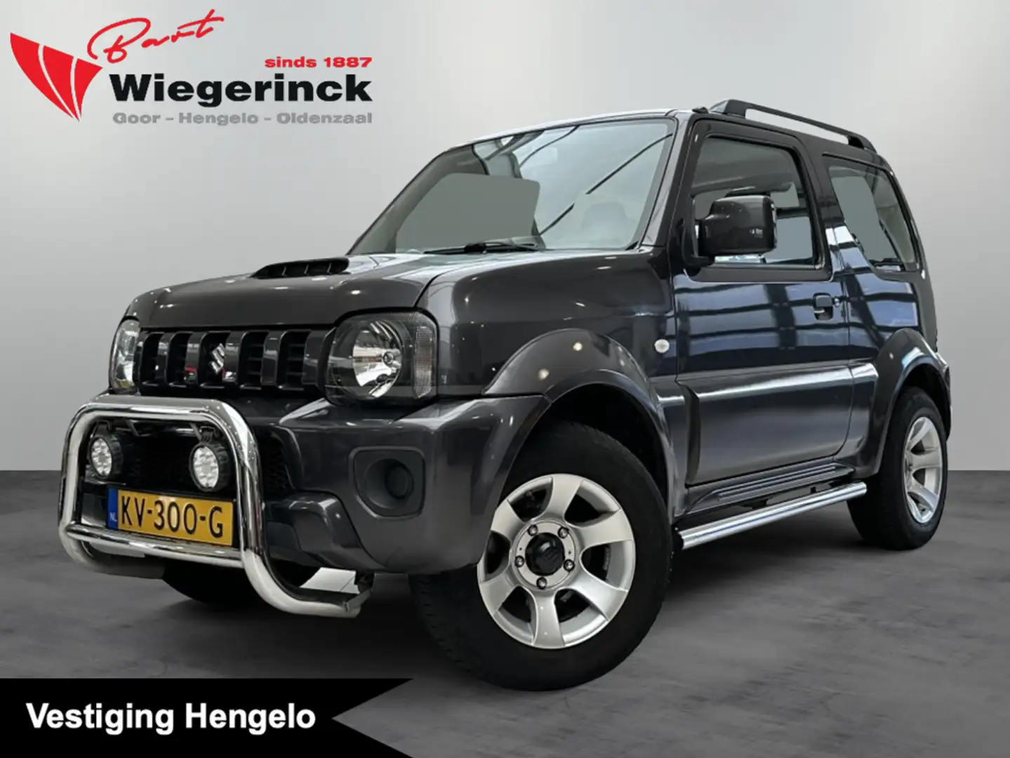 Suzuki Jimny 1.3 Exclusive [ AUTOMAAT | BULLBAR I TREKHAAK I AI Gris - 1