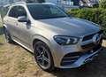 Mercedes-Benz GLE 450 AMG Line. 7 zitpl. Klassieke benzine Mercedes SUV Beige - thumbnail 1