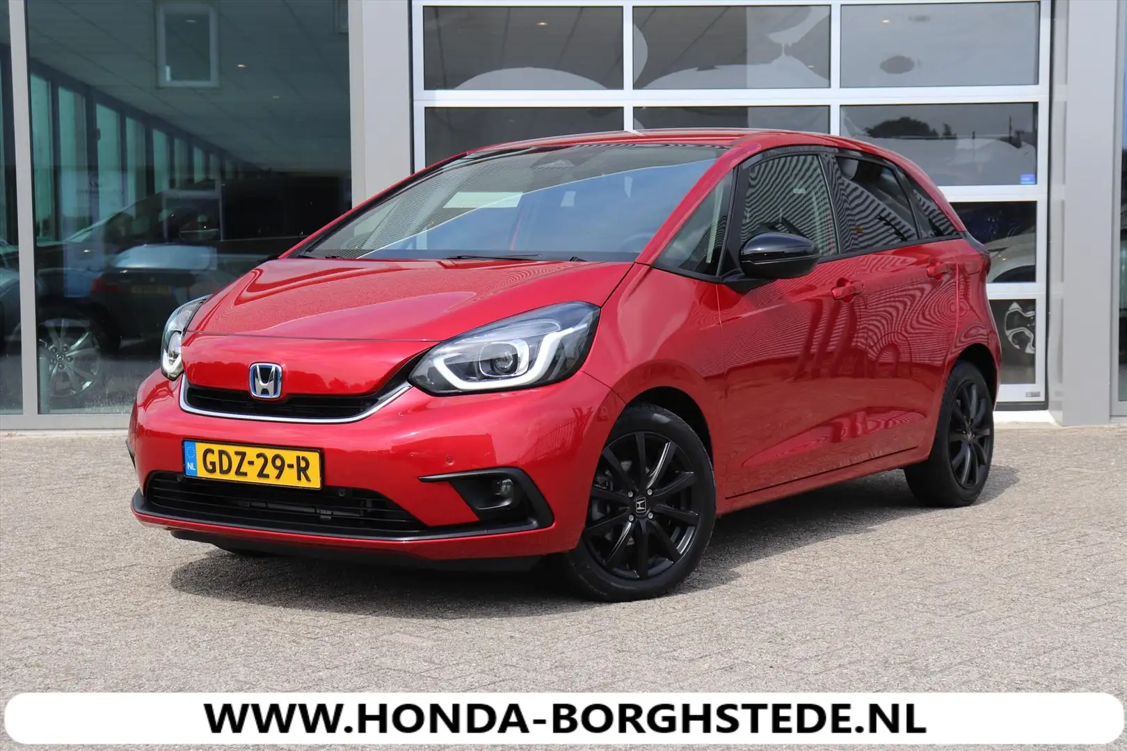 Honda Jazz 1.5 Full Hybrid Executive Automaat.Rijklaar Rood - 1