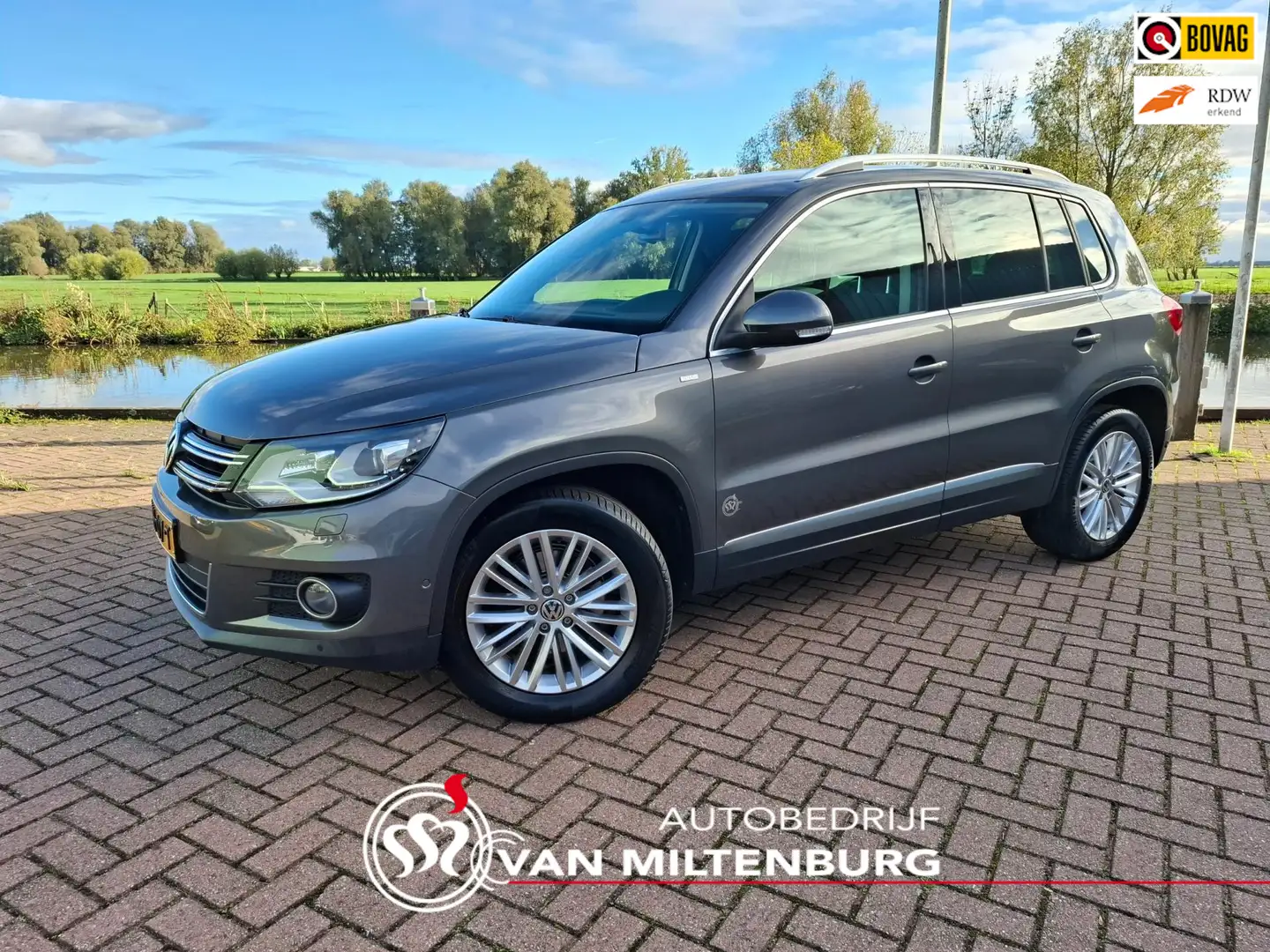 Volkswagen Tiguan 1.4 TSI Sport&Style Clima Stoelverw. PDC V+A Grijs - 1
