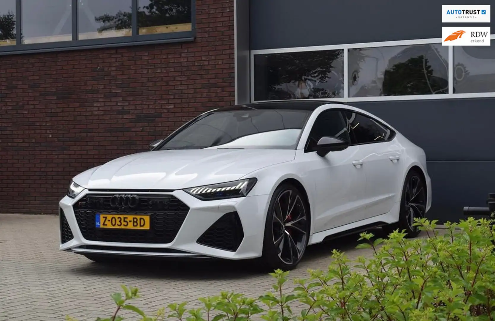 Audi RS7 Sportback 4.0 TFSI V8 Quattro|Keramisch|Head-up Wit - 1