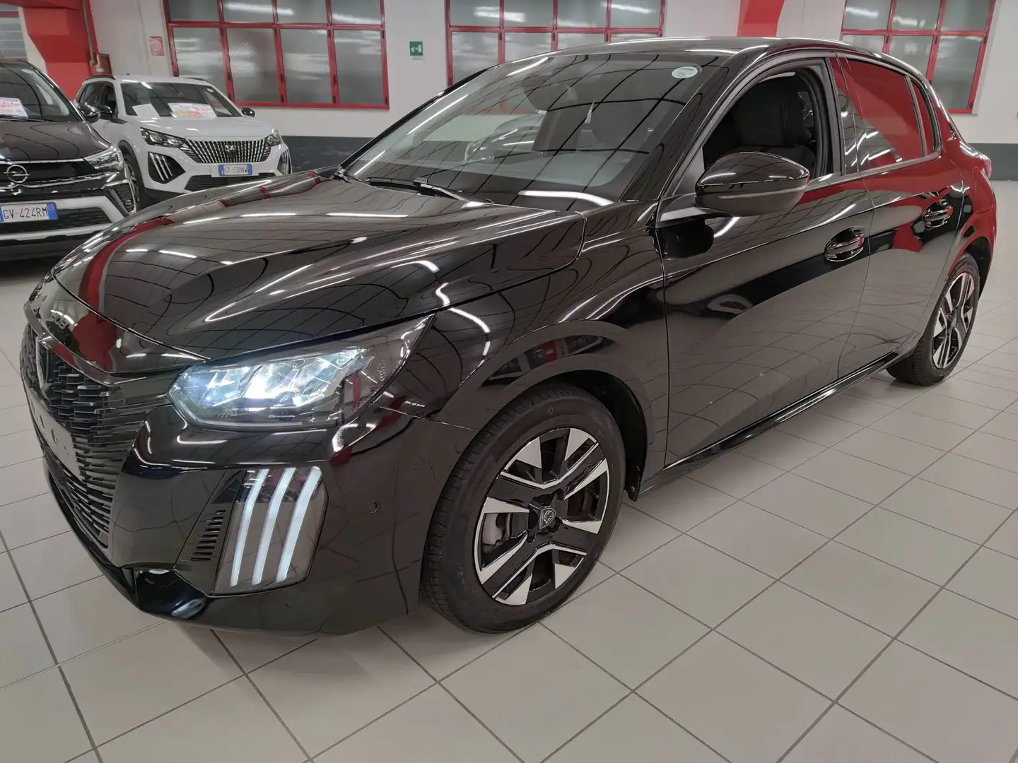 Peugeot 208 1.2 100cv 5p Allure + Car Play SUPER PROMO Zwart - 1