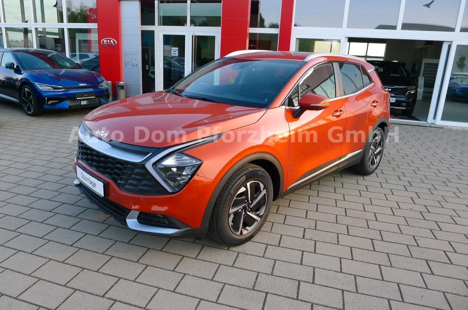 Kia Sportage 1.6 T-GDI EcoDyn Vision DCT 4WD Komfort Orange - 1