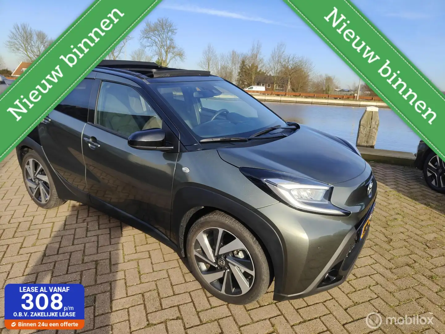 Toyota Aygo X CABRIO DAK - AUTOMAAT 1.0 VVT-i S-CVT Pulse AUTOMA Grün - 1
