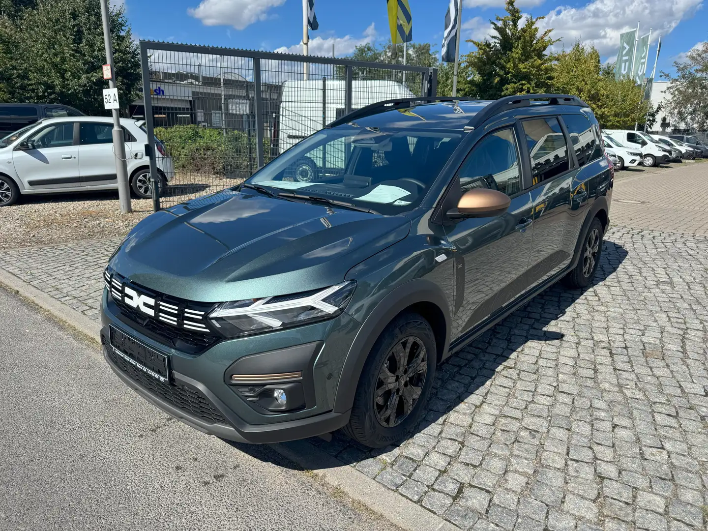 Dacia Jogger Extreme HYBRID 140 7-Sitzer CityP Navi SitzH Grün - 2