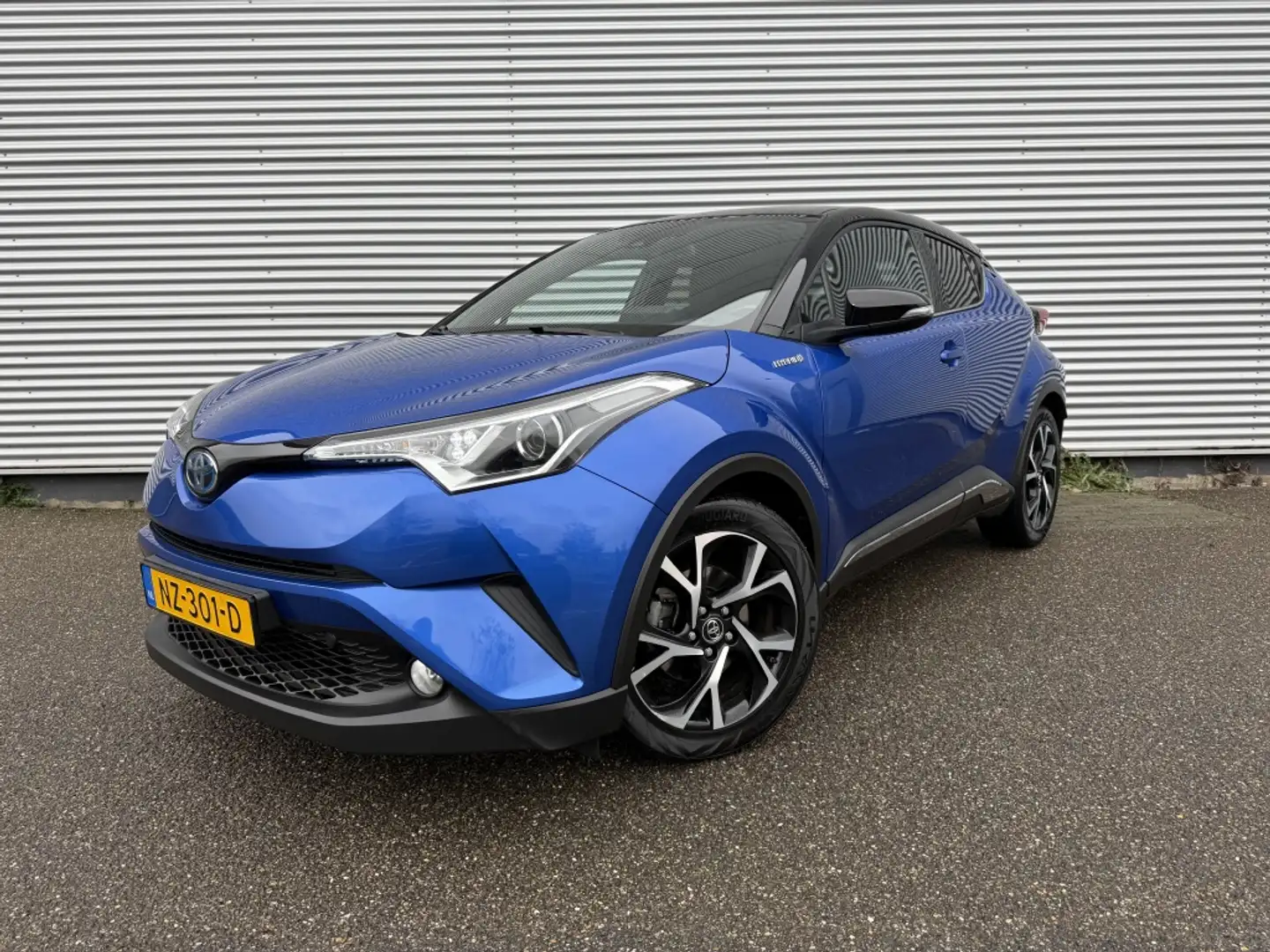 Toyota C-HR 1.8 Hybrid Bi-Tone NAP Trekhaak navi 18" stoelverw Blau - 1