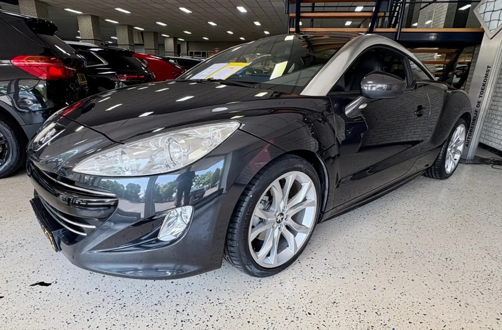 Peugeot RCZ 1.6 THP 156pk LM19 Leder PDC ECC Airco Memory NAP Gris - 1